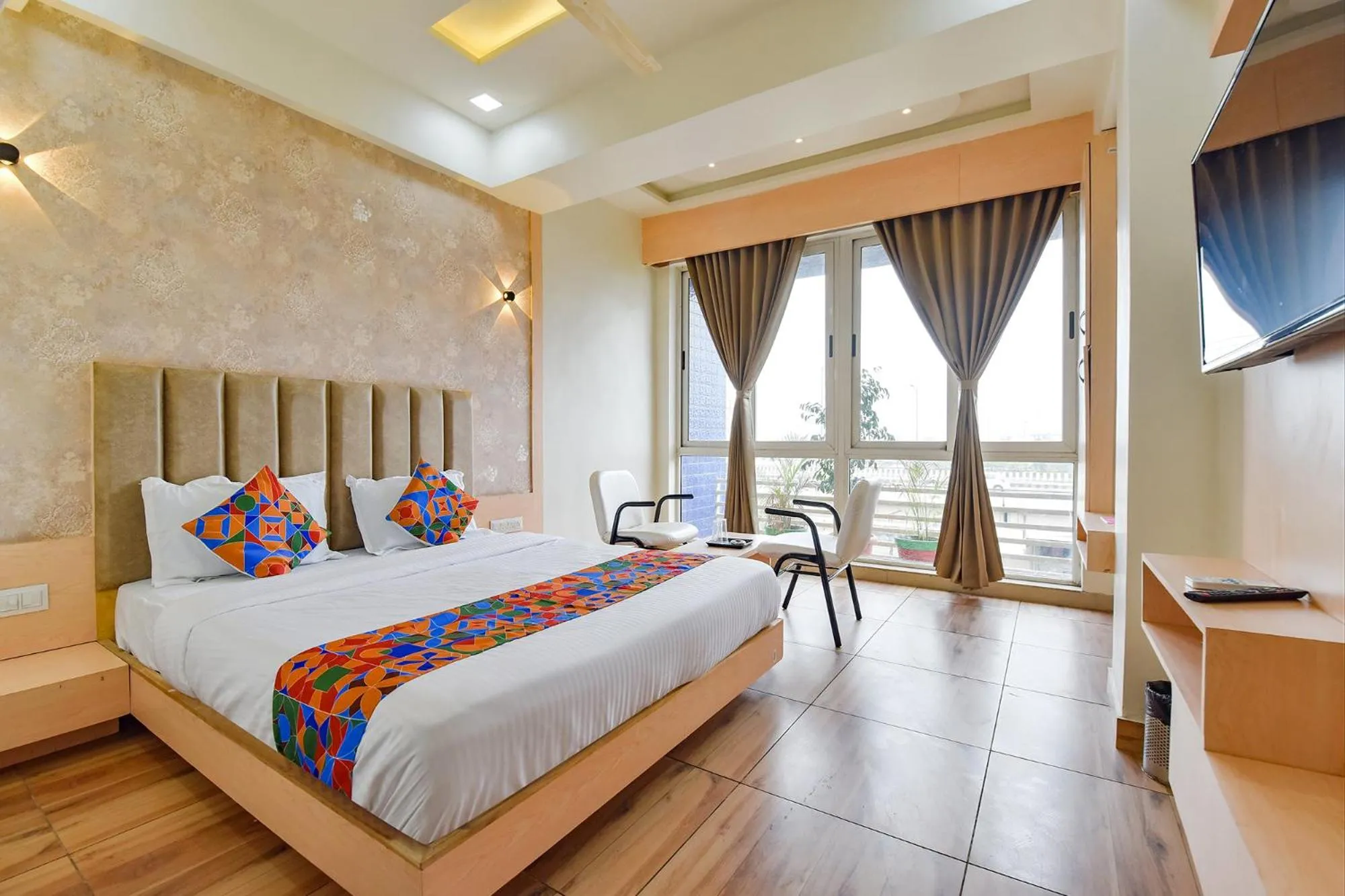 Bed in FabHotel Symphony Grand - Inside Barcelona Complex