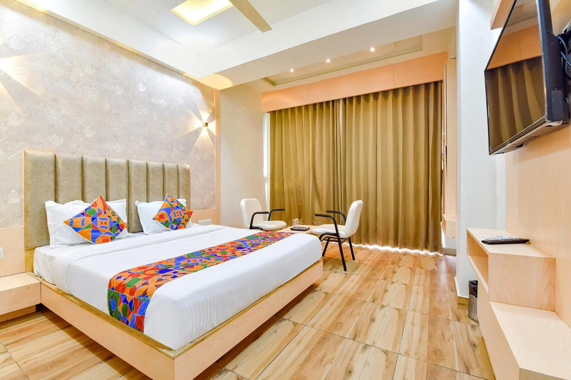 Bed in FabHotel Symphony Grand - Inside Barcelona Complex