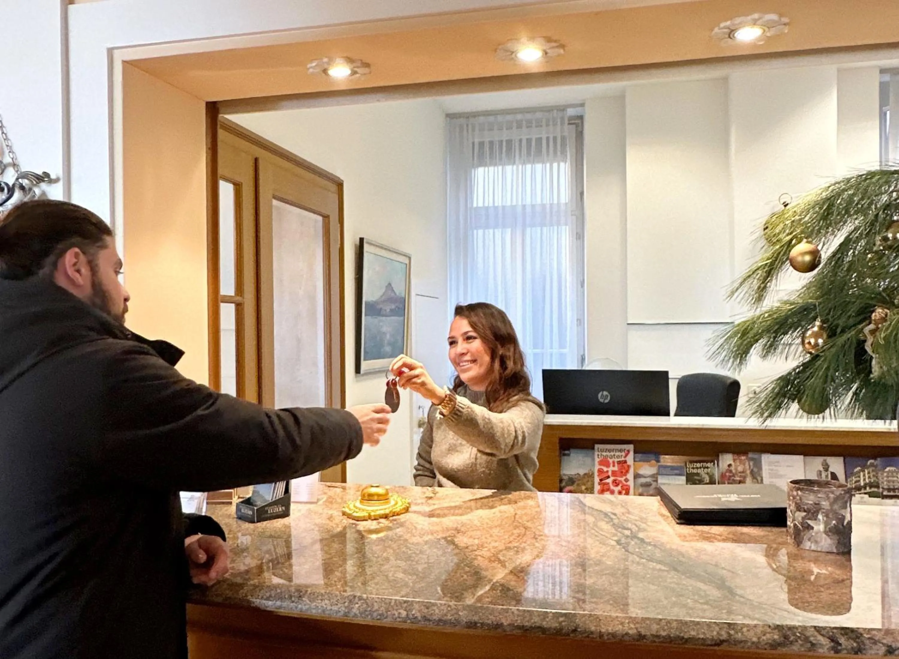 Lobby or reception in Hotel Royal Luzern