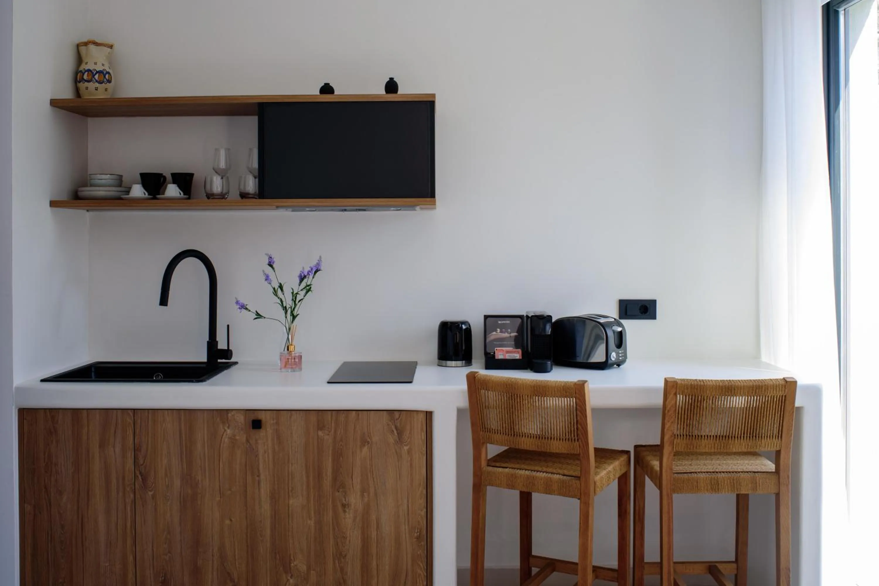 Kitchen or kitchenette in Ryolithos Suites