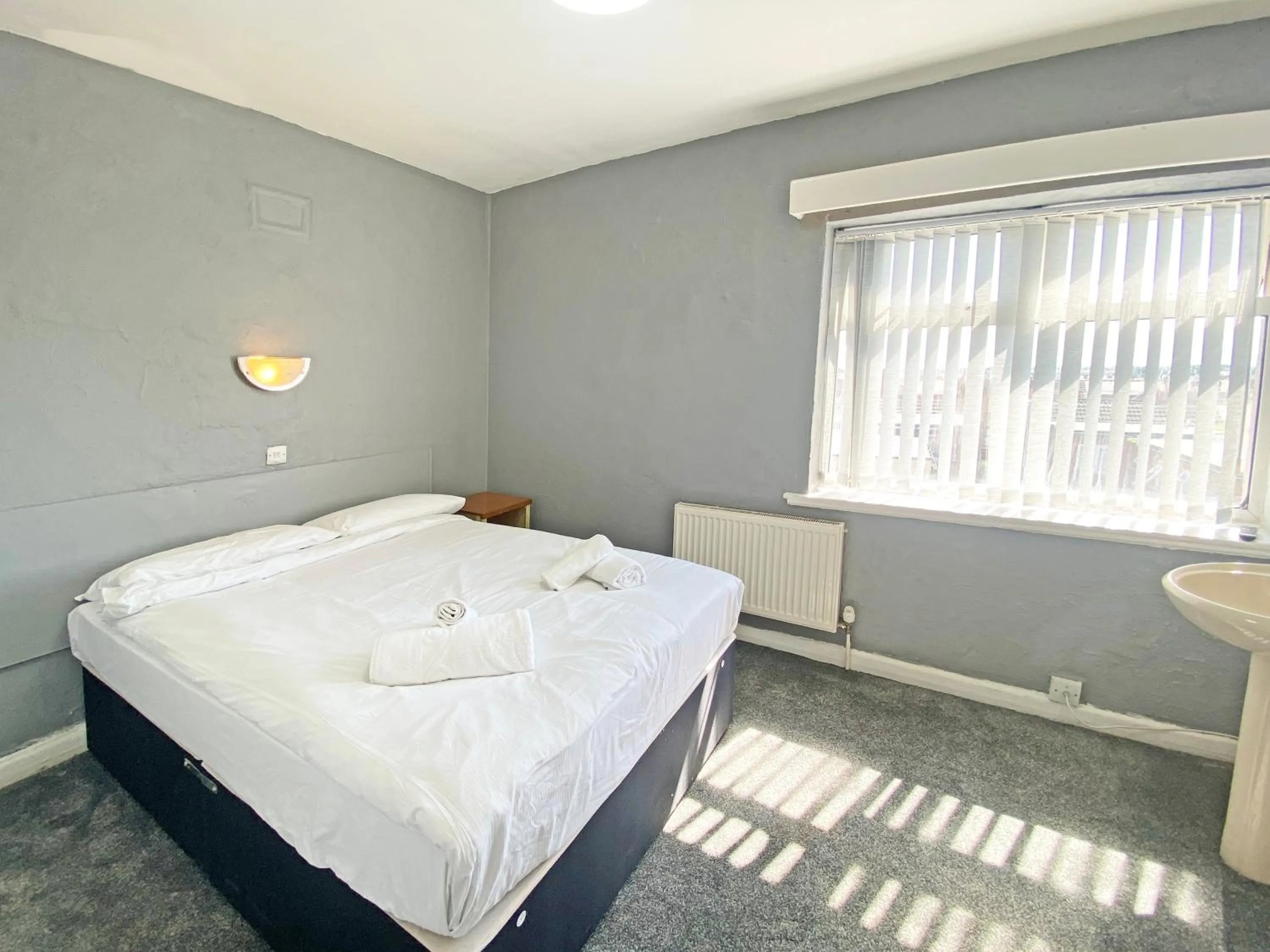 Bedroom in The J & S Hotel