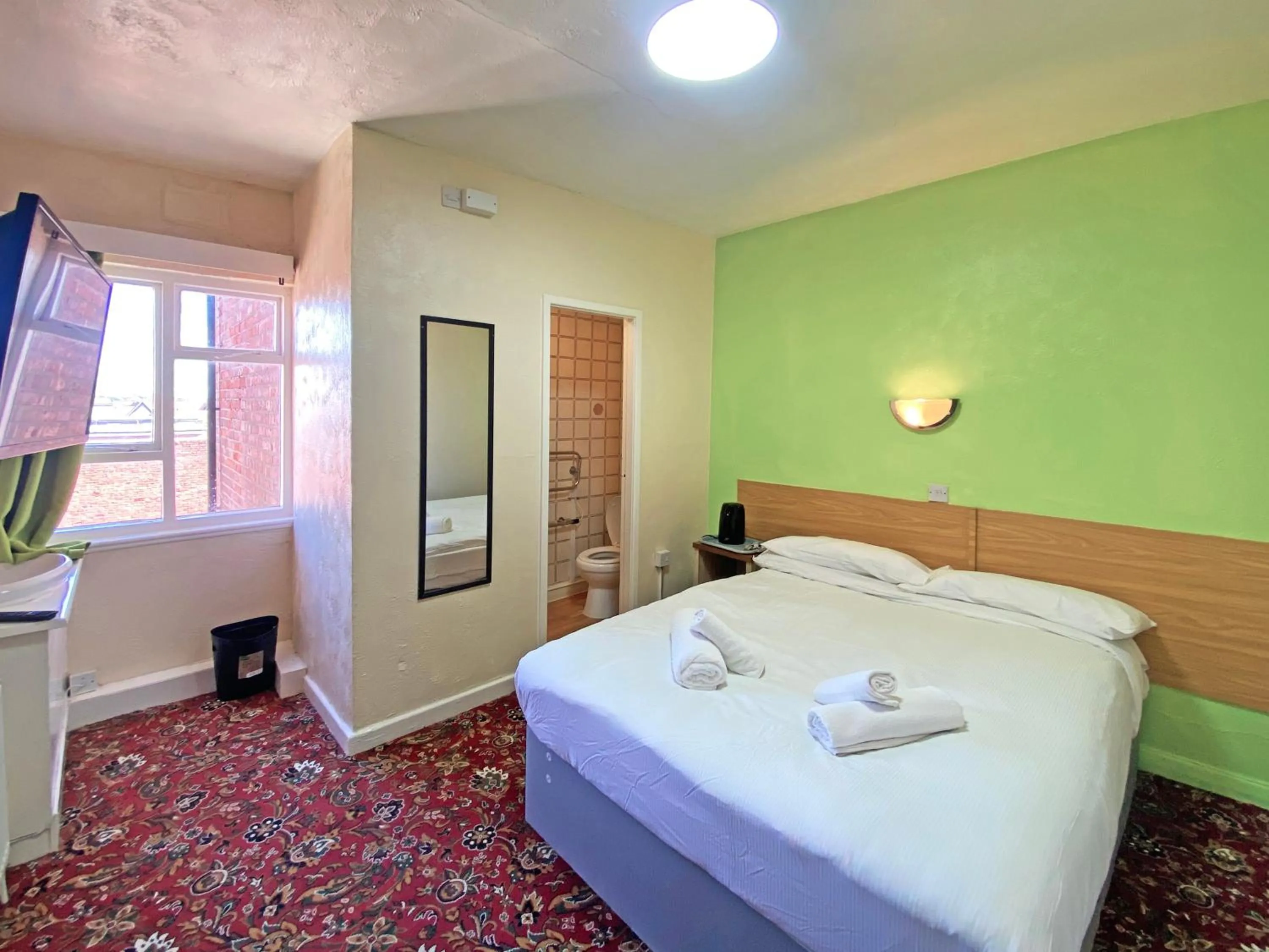 Bedroom in The J & S Hotel