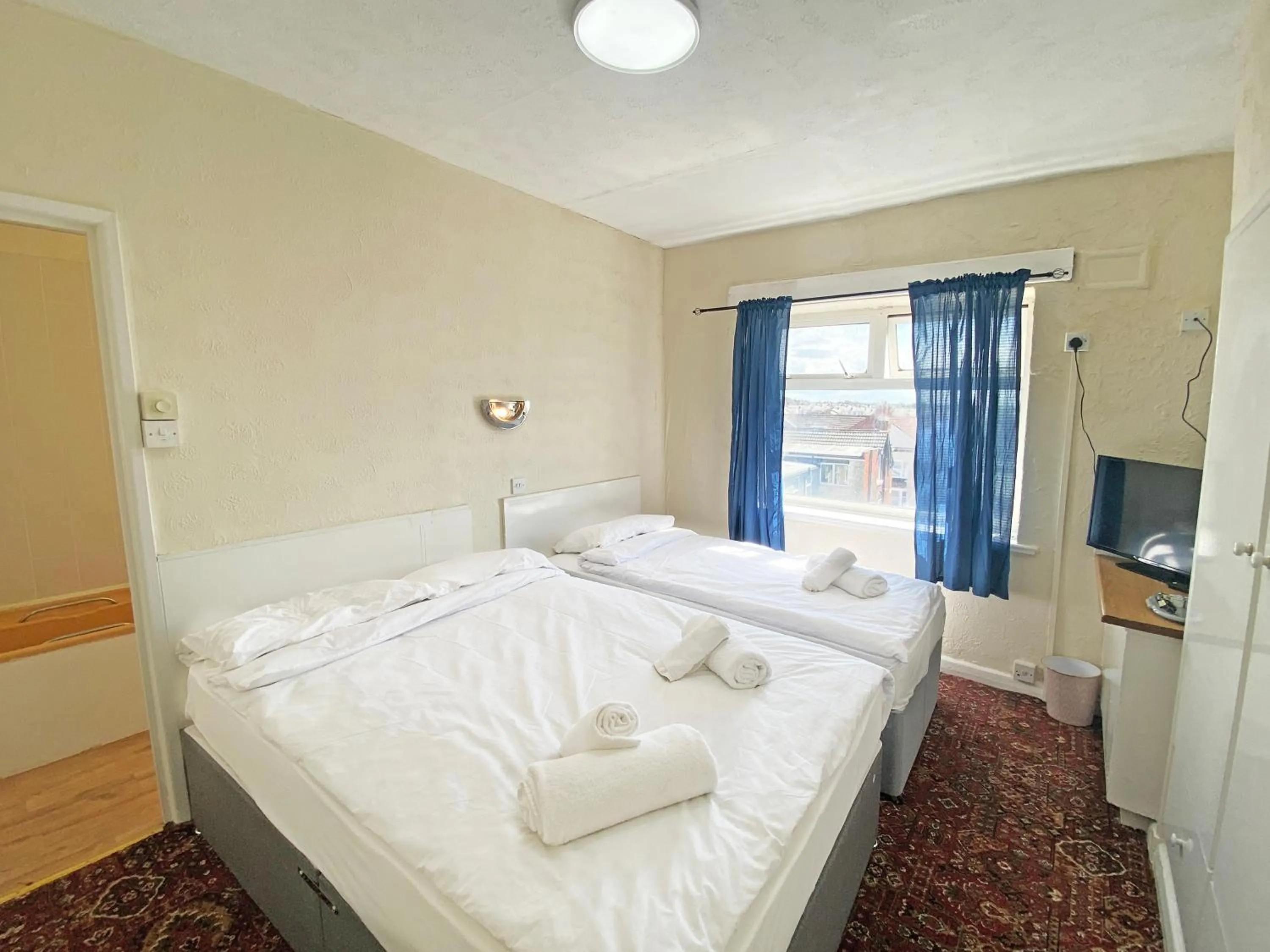 Bedroom in The J & S Hotel