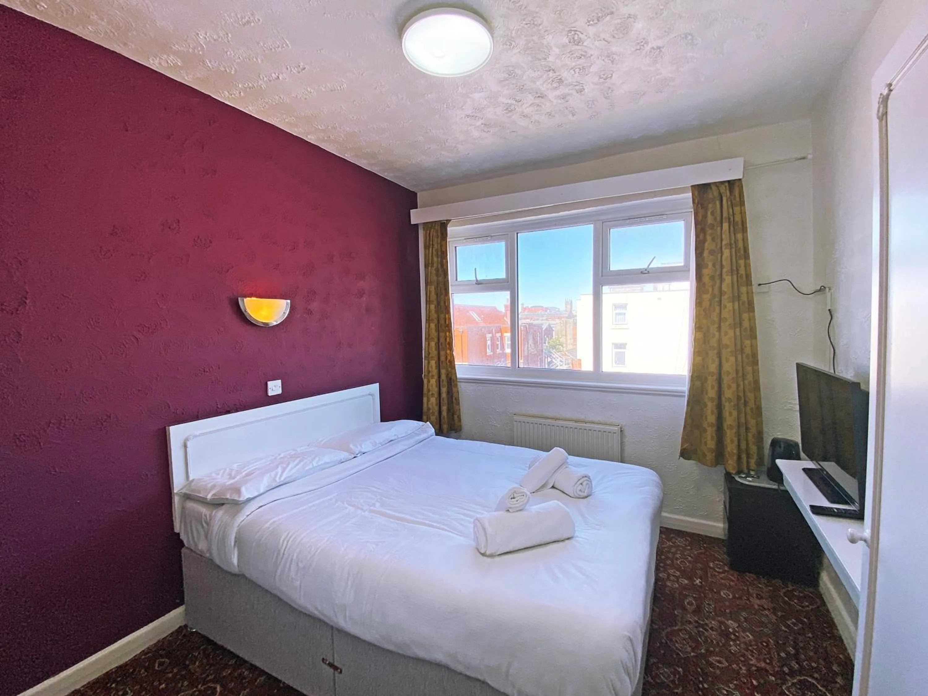 Bedroom in The J & S Hotel