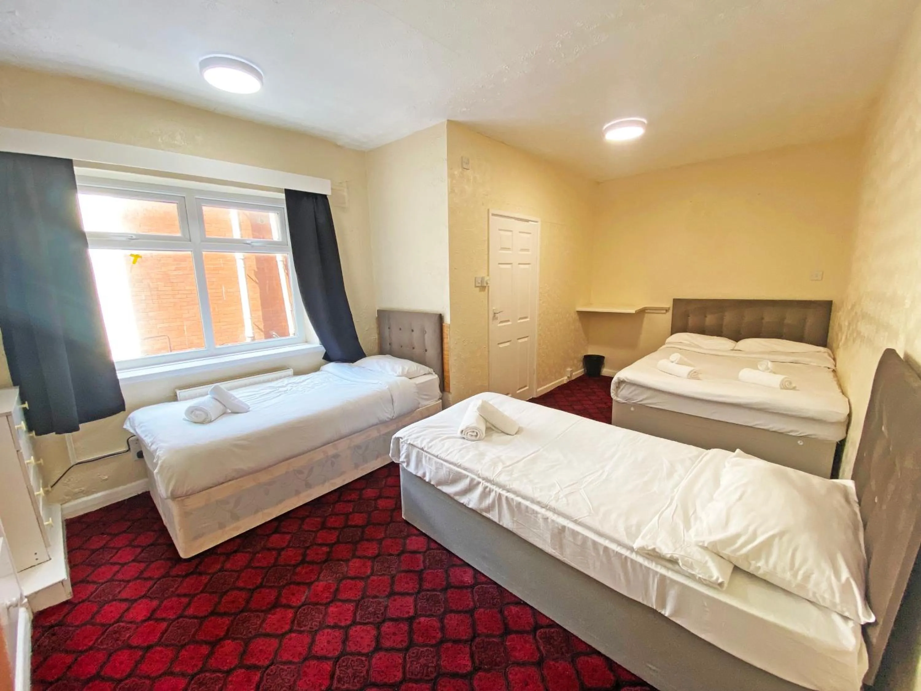 Bedroom in The J & S Hotel