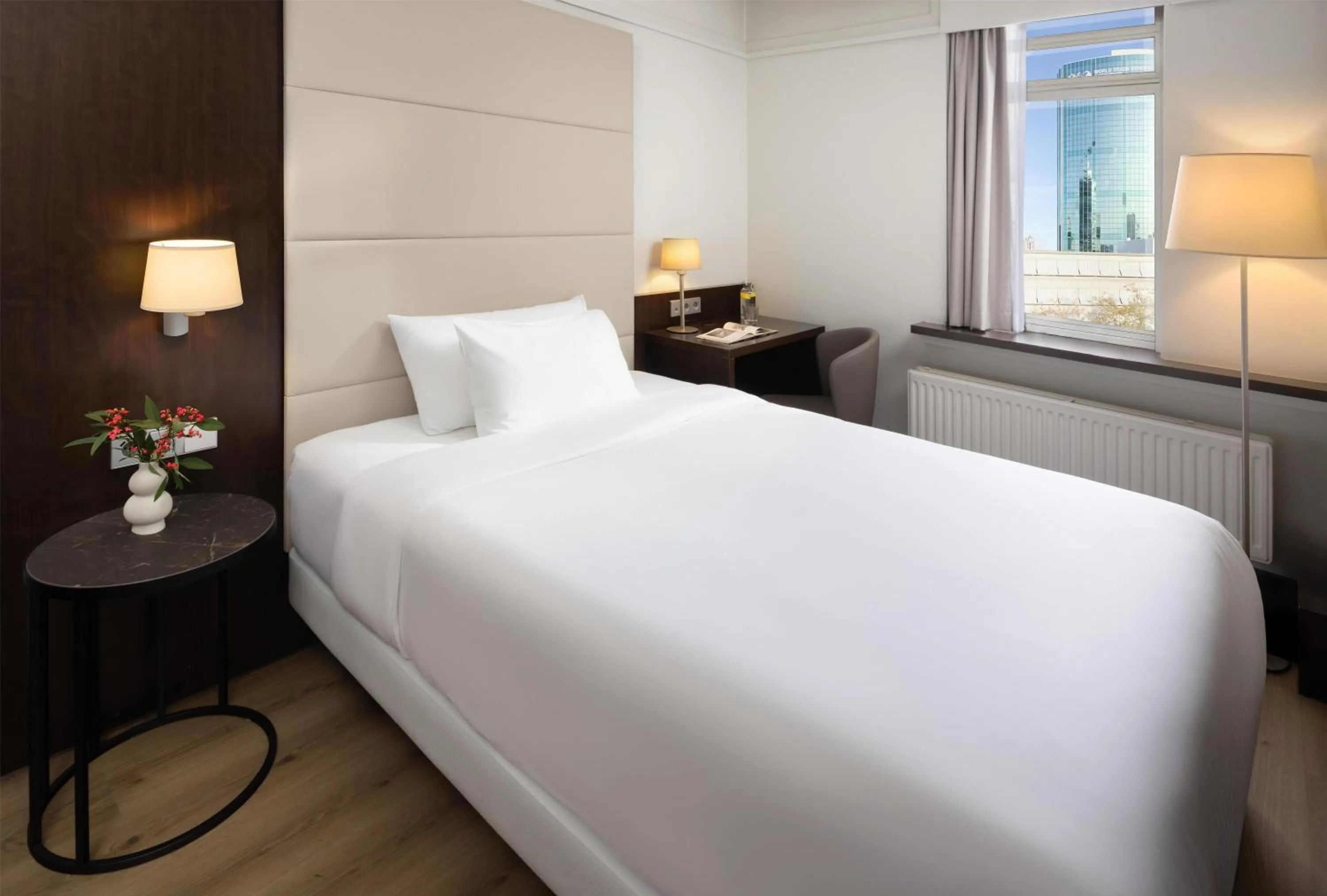 Bedroom, Bed in NH Atlanta Rotterdam Hotel