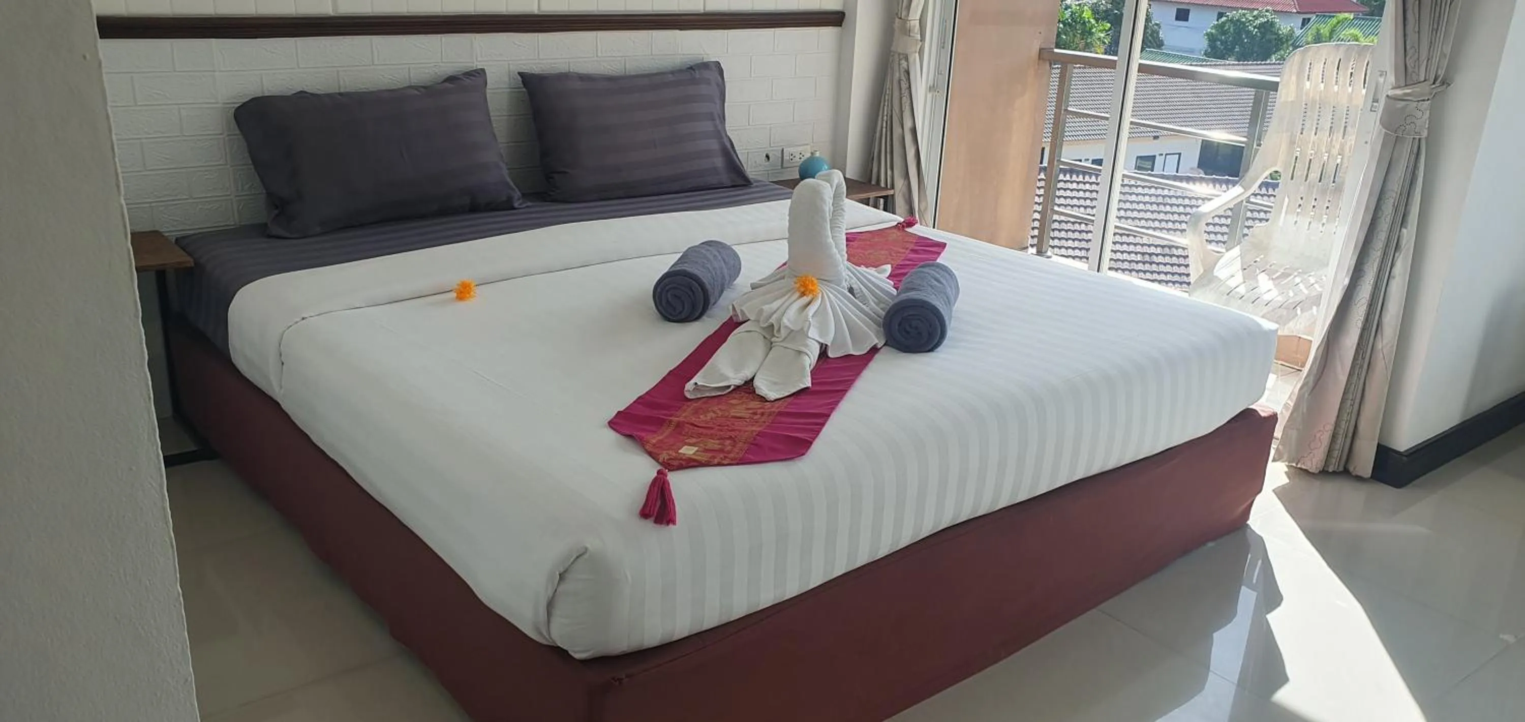 Bed in At Home Hotel