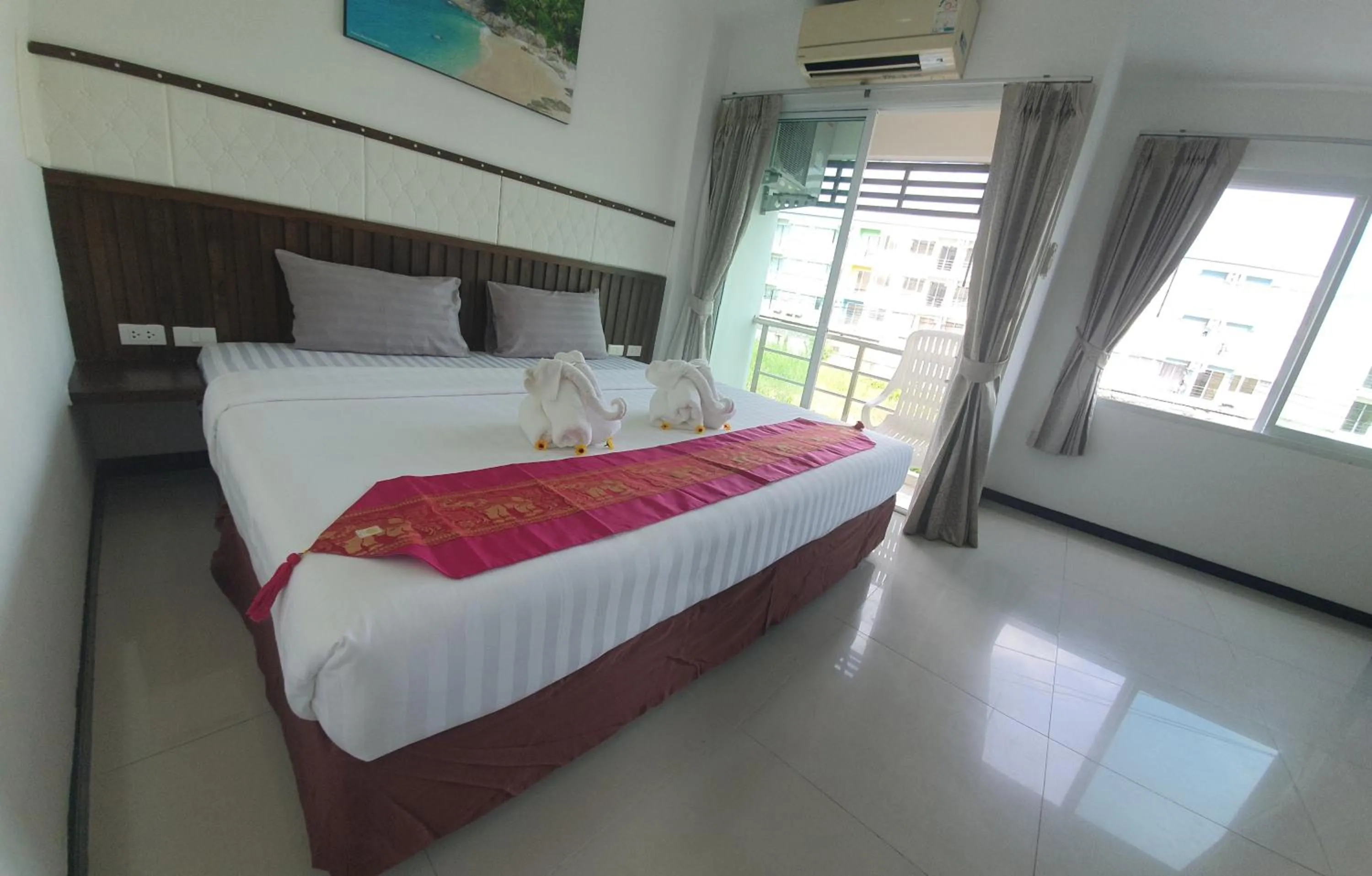 Bed in At Home Hotel