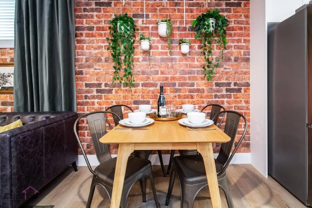 Seating area in Luxe New York Style Bsmt Suite, Near DT & WEM, King Bed, WiFi