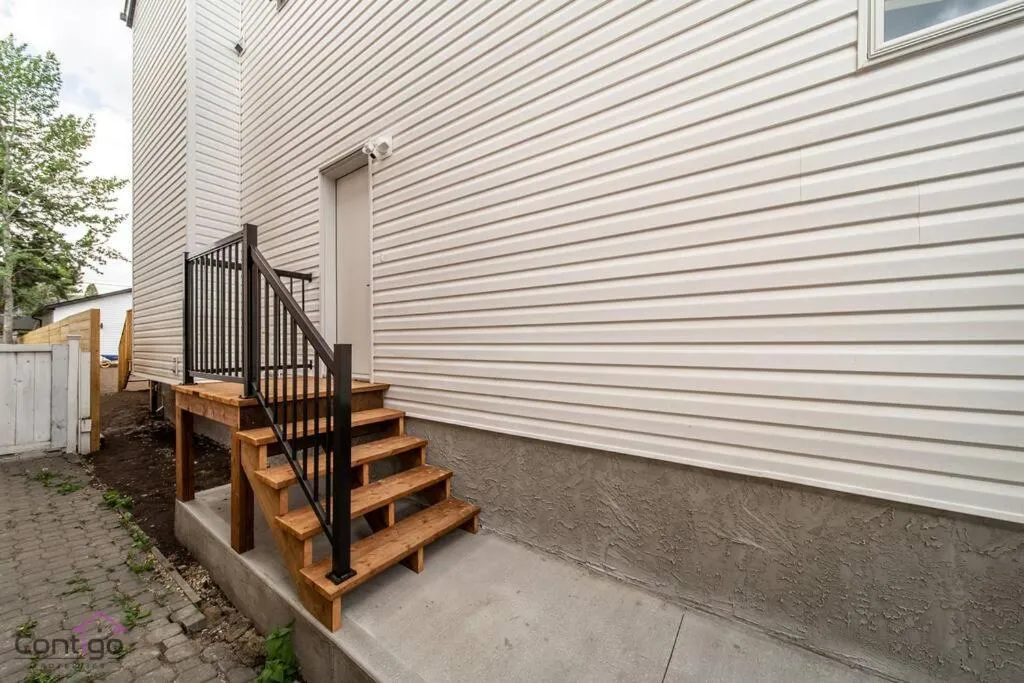 Property building in Luxe New York Style Bsmt Suite, Near DT & WEM, King Bed, WiFi