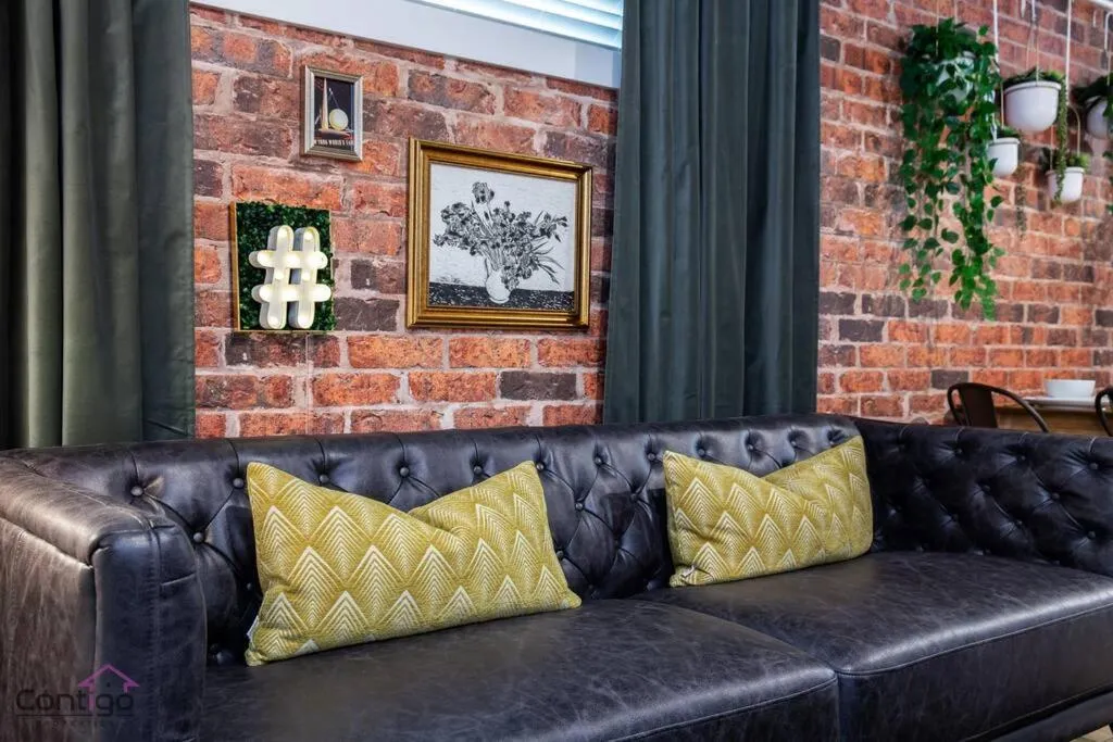 Living room in Luxe New York Style Bsmt Suite, Near DT & WEM, King Bed, WiFi