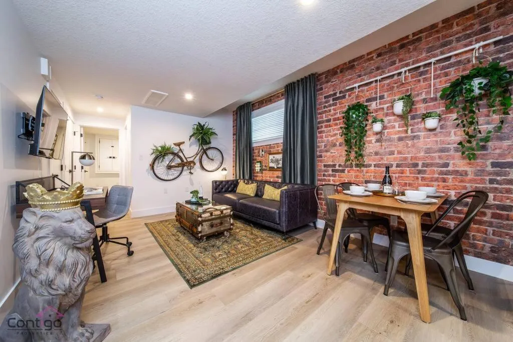 Living room in Luxe New York Style Bsmt Suite, Near DT & WEM, King Bed, WiFi