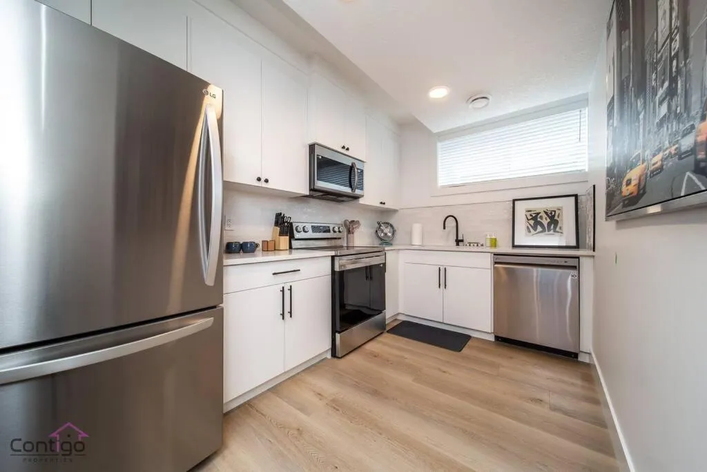 Kitchen or kitchenette in Luxe New York Style Bsmt Suite, Near DT & WEM, King Bed, WiFi
