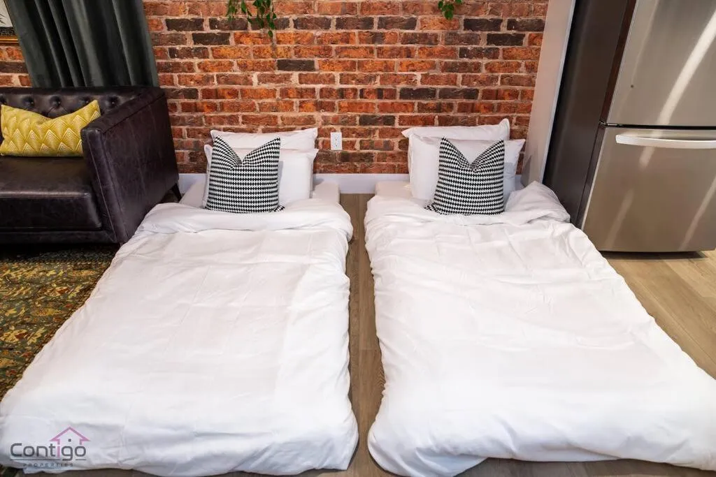 Bed in Luxe New York Style Bsmt Suite, Near DT & WEM, King Bed, WiFi