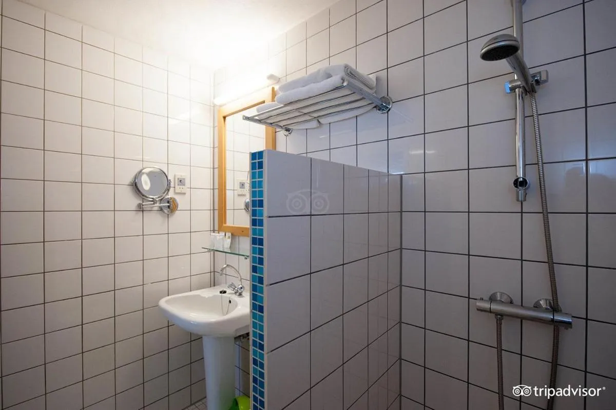 Bathroom in Rho Hotel