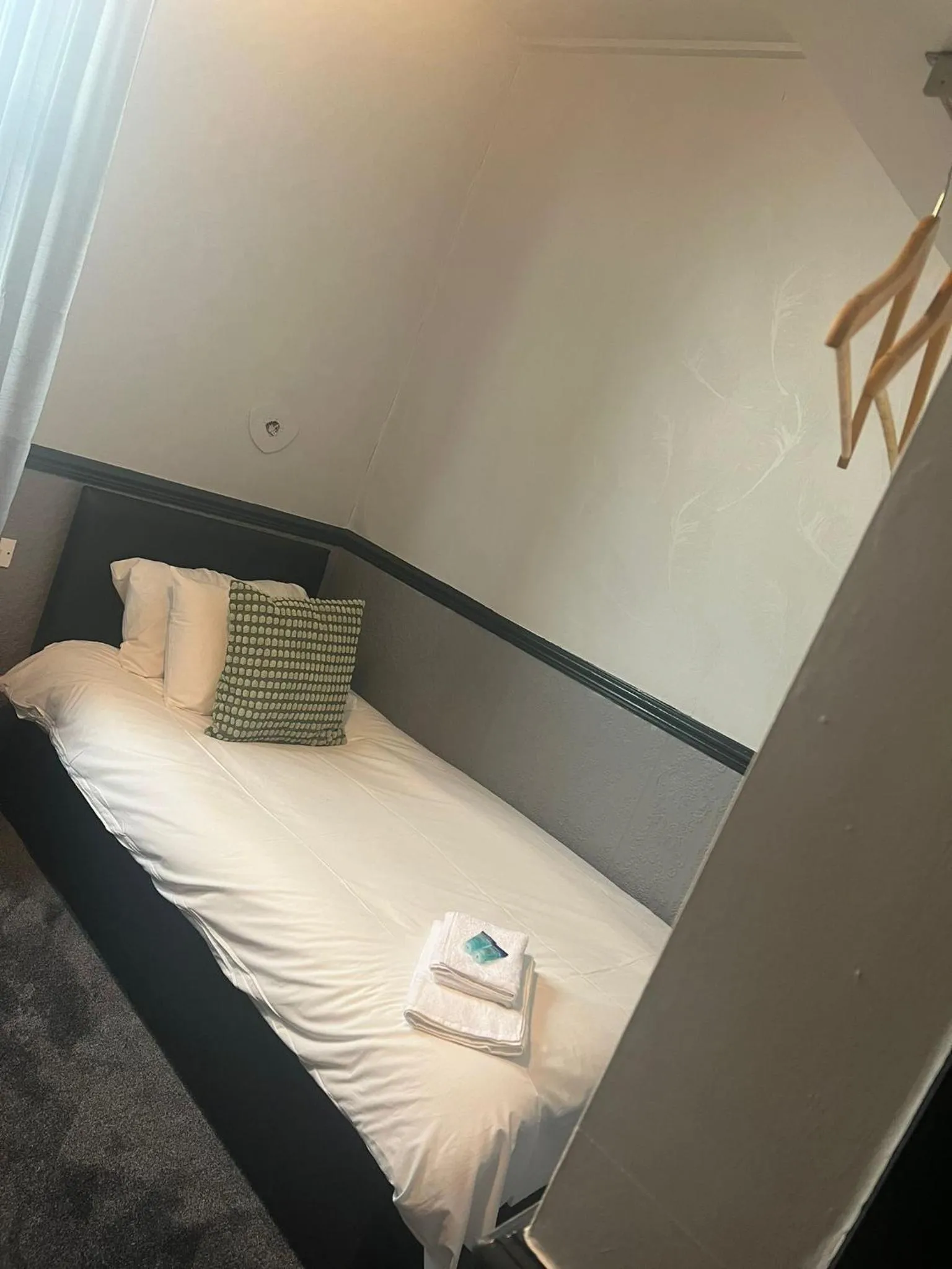 Bed in The Charles Dickens Hotel