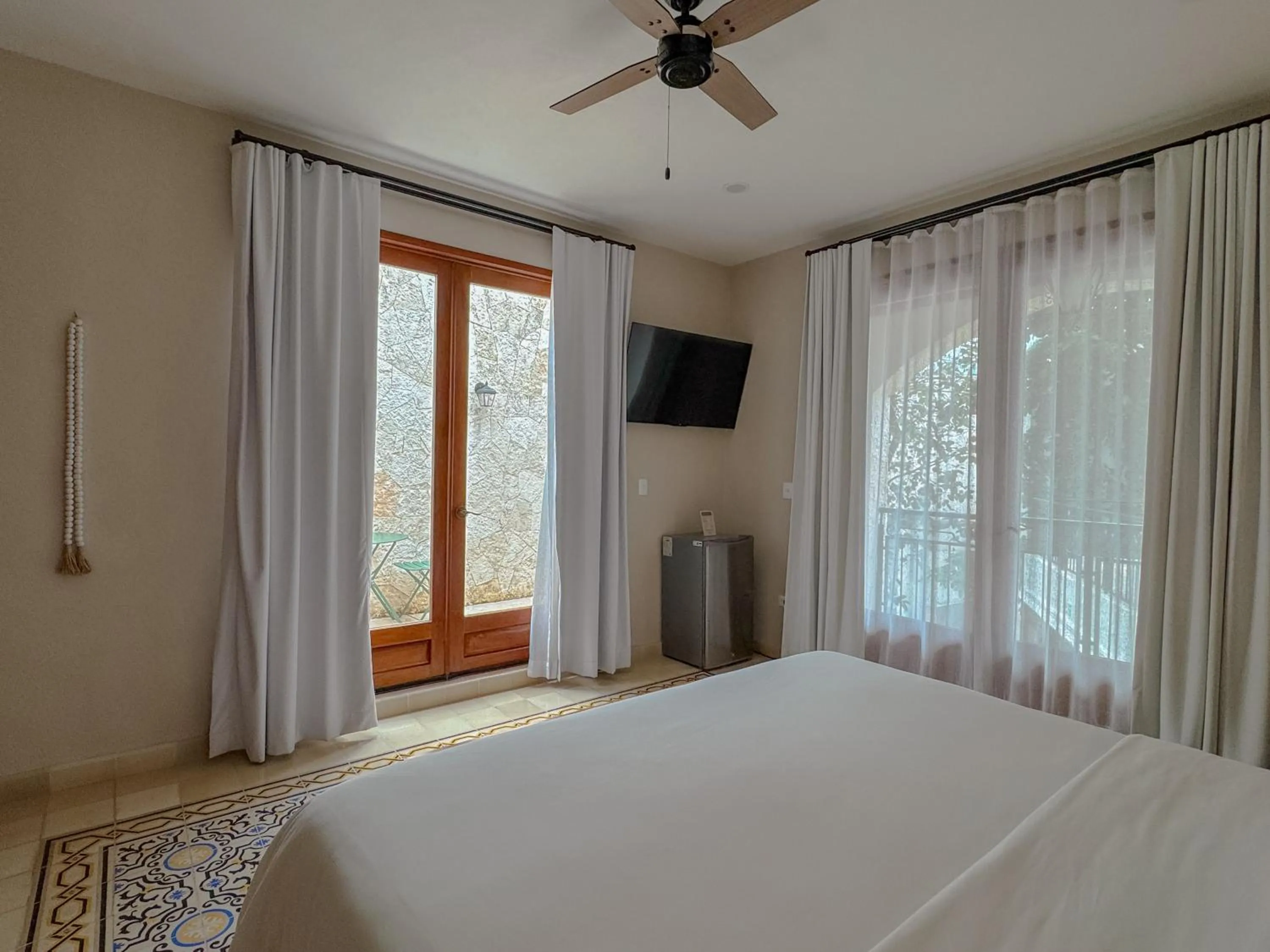 Bed in Frater Yucatán Hotel