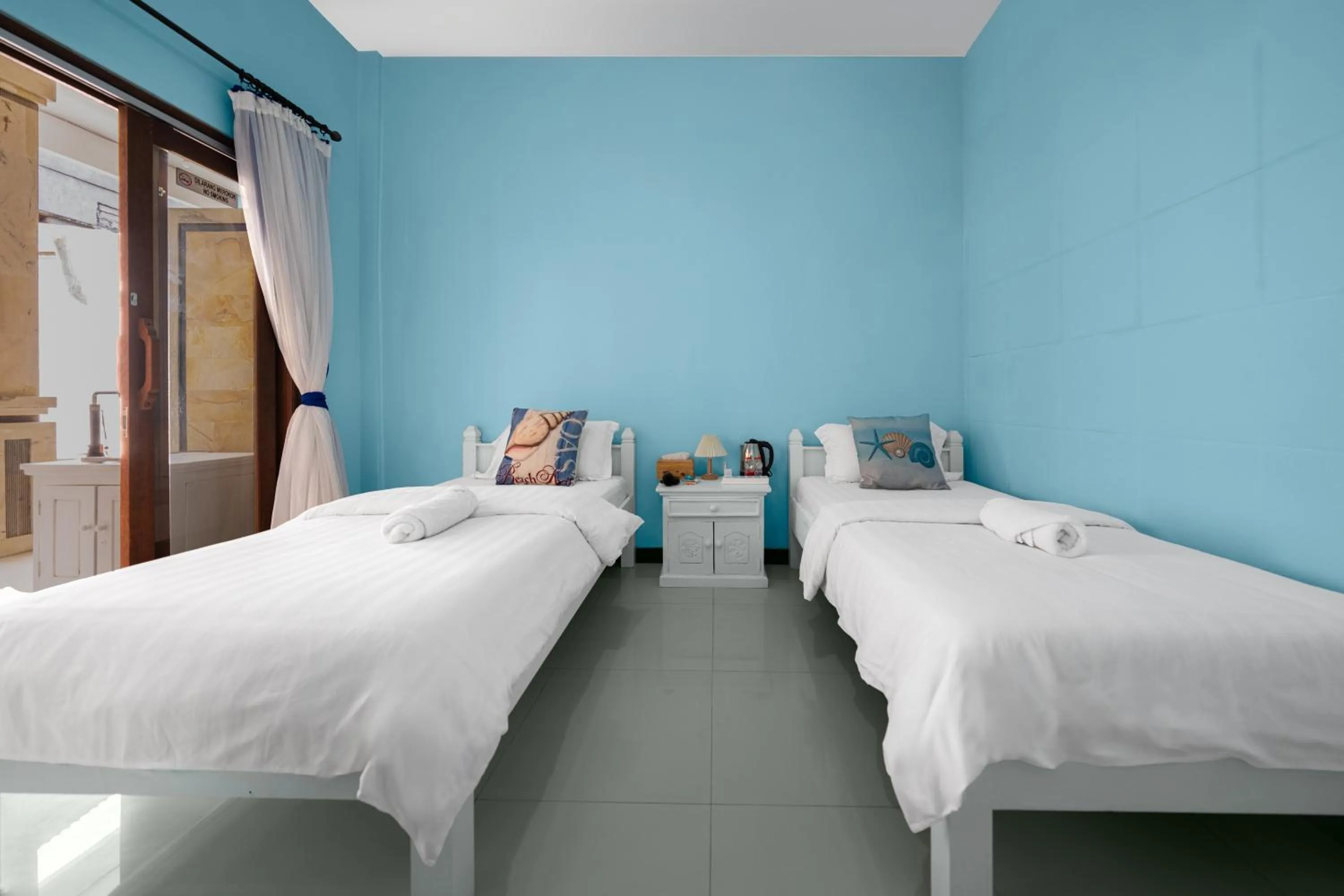 Bed in Dive & Dwell Tulamben