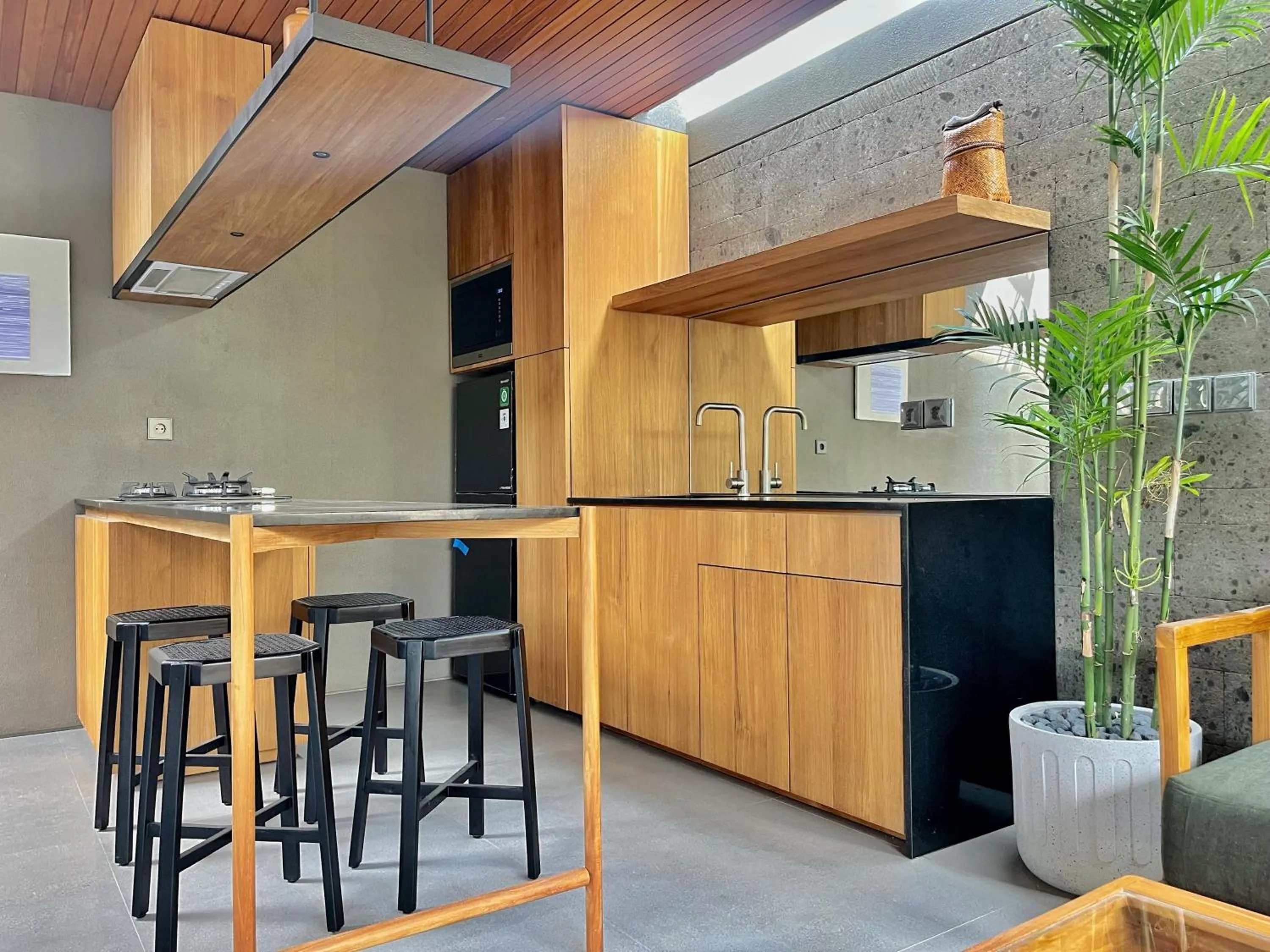 Kitchen or kitchenette in Domisili Villas Canggu Bali by Fays Hospitality