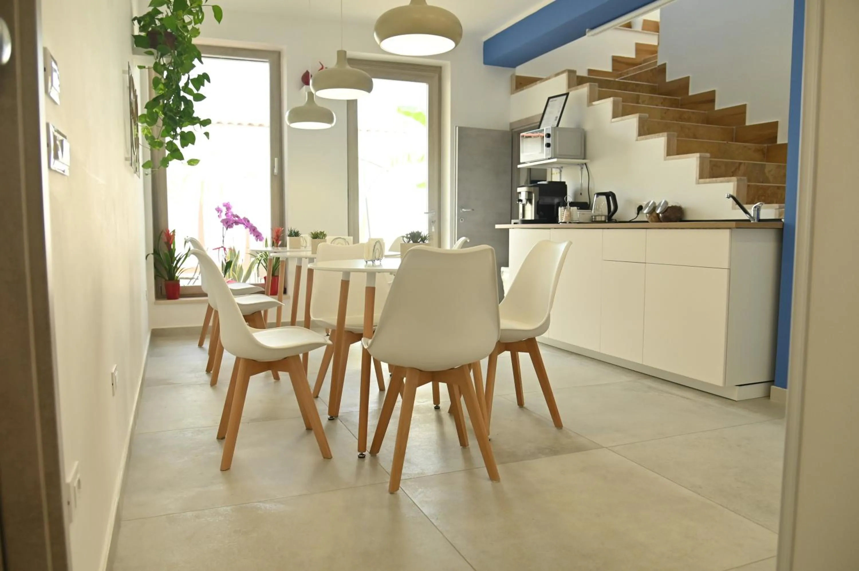 Communal lounge/ TV room, Dining Area in Civico 31 Luxury rooms