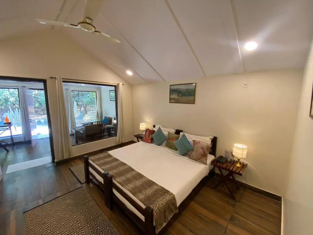 Bed in The Aranya Nature Resort