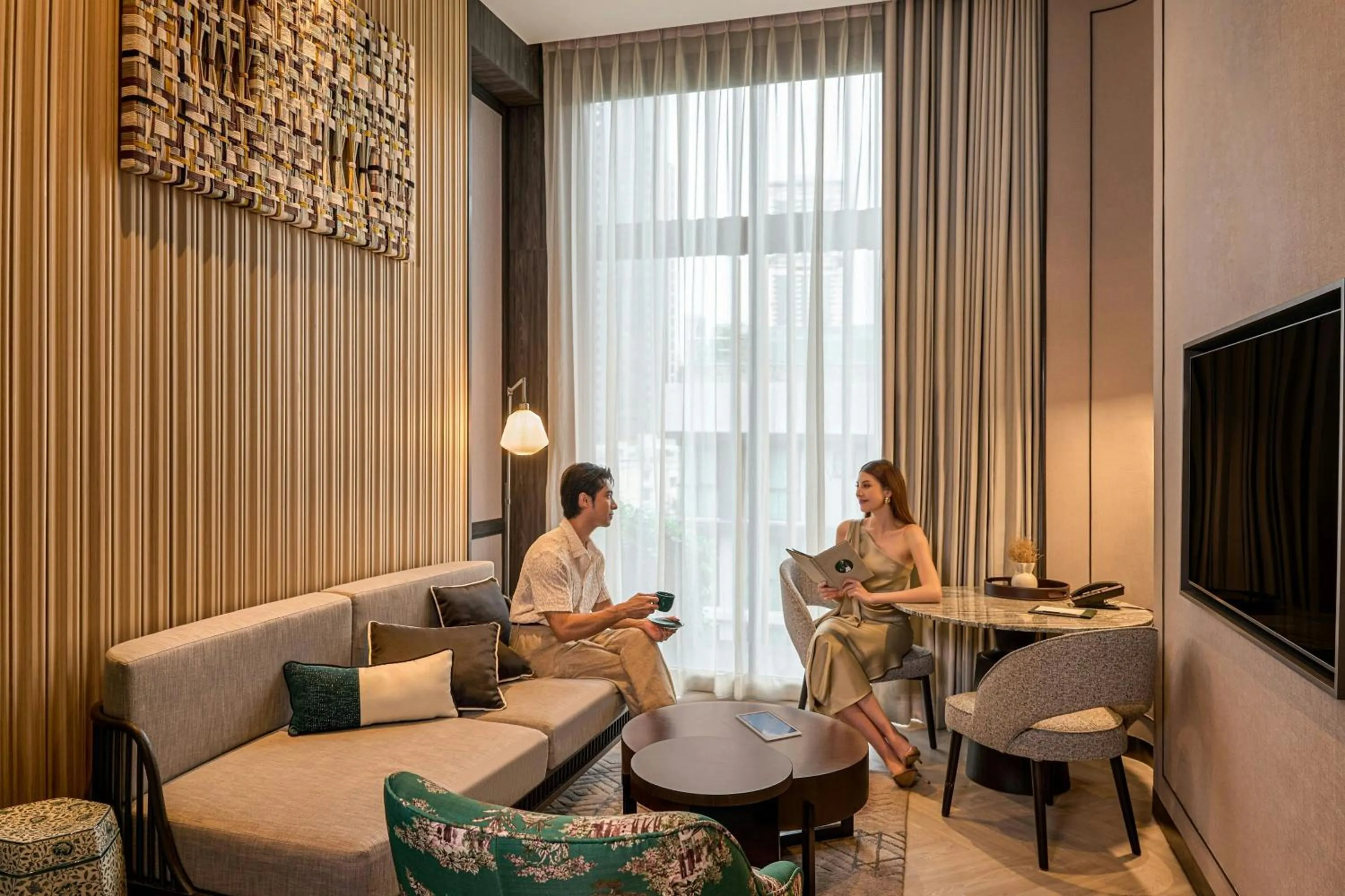 Living room in Madi Paidi Bangkok, Autograph Collection