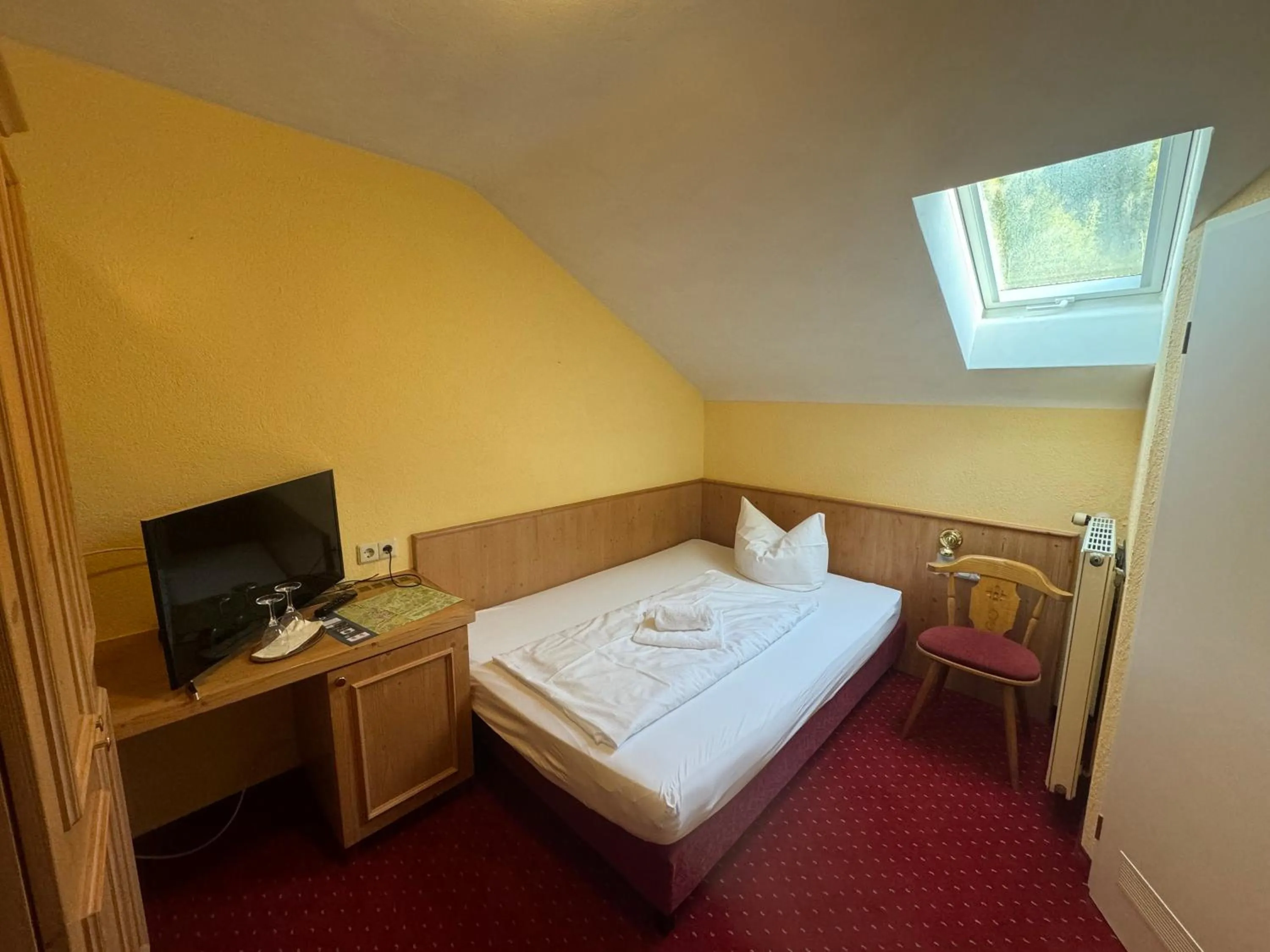 Photo of the whole room, Bed in Landhotel Alte Post