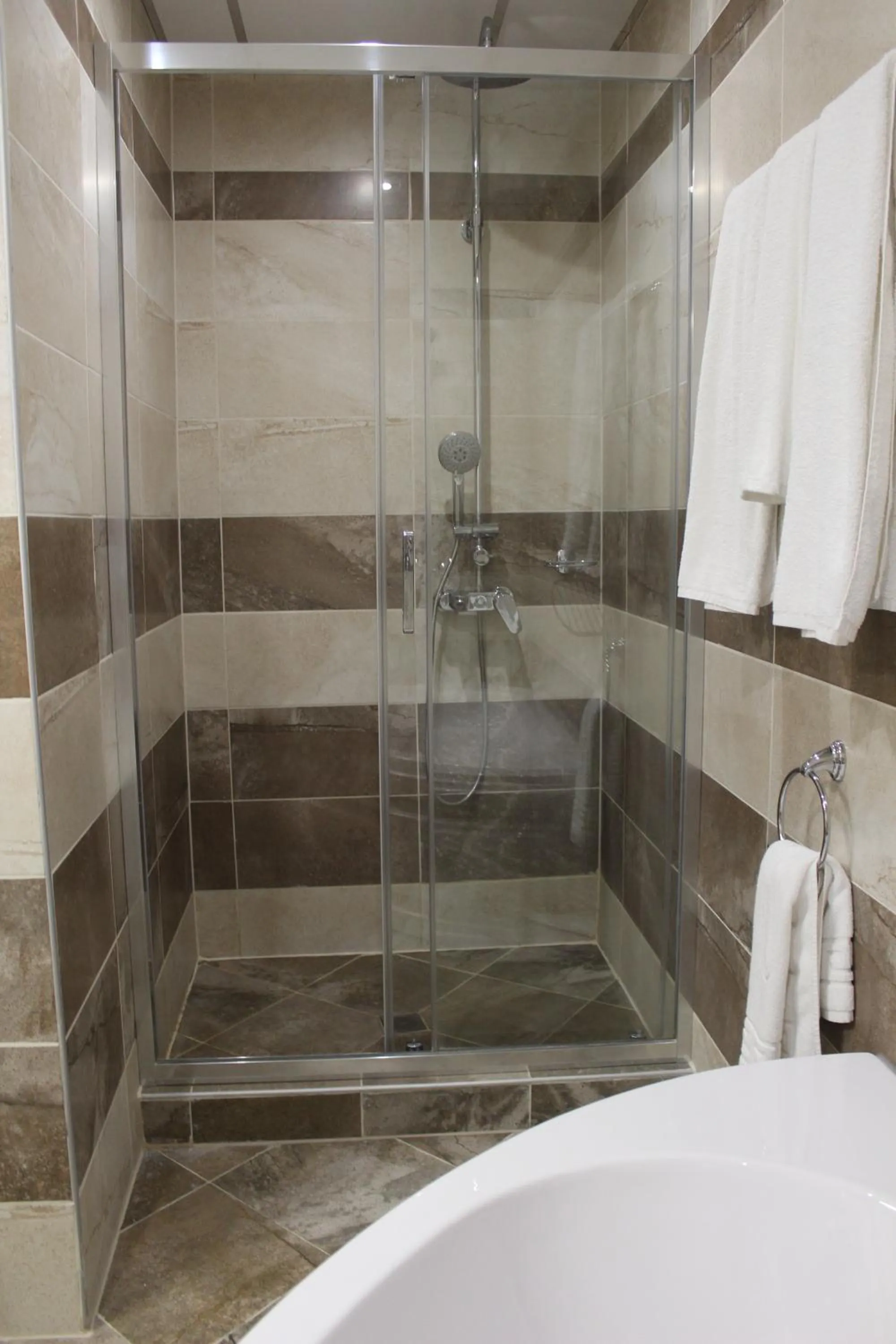 Bathroom in Vemara City Boutique Hotel-free parking