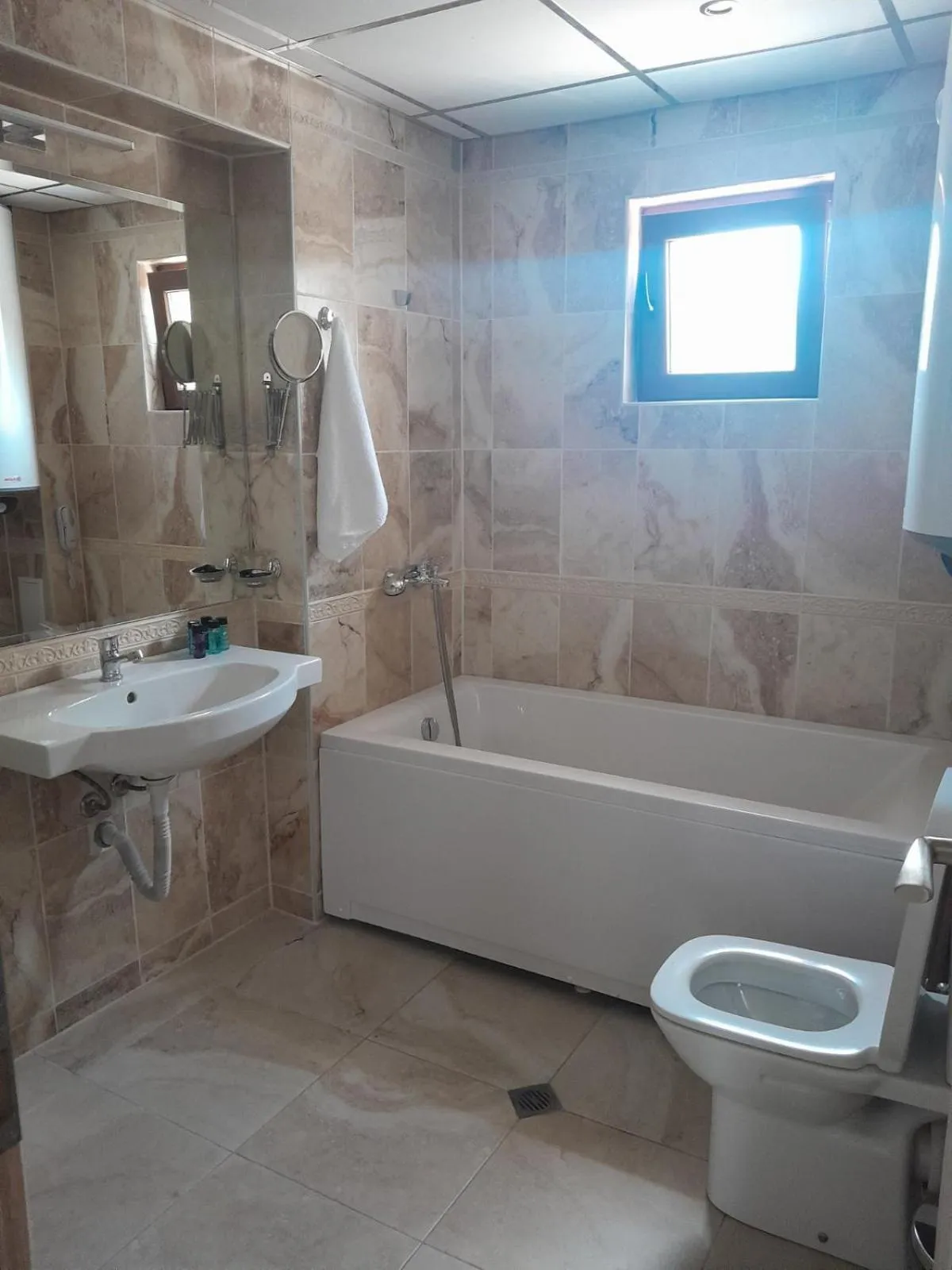 Bathroom in Vemara City Boutique Hotel-free parking