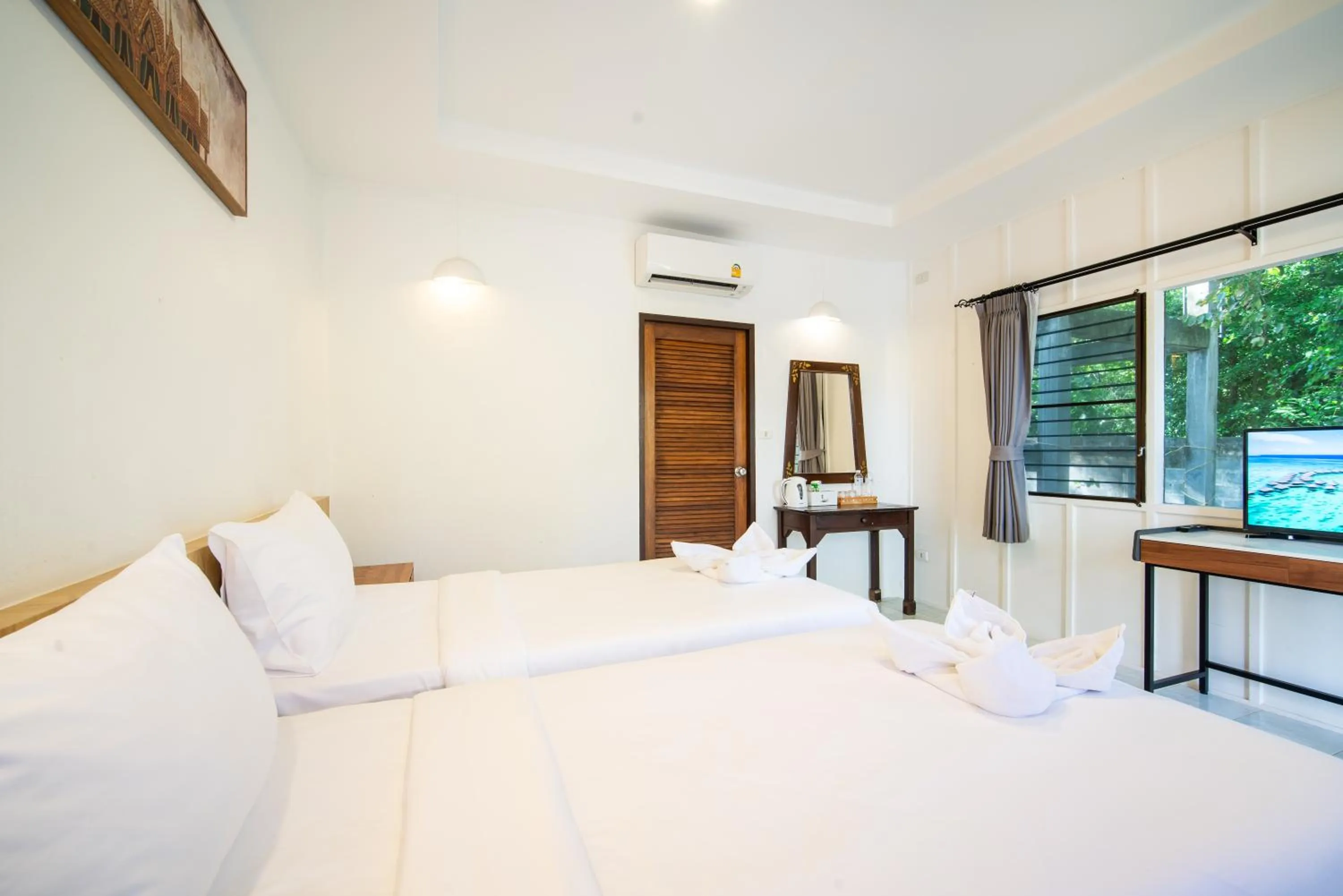 Photo of the whole room, Bed in Ban Raya Resort and Spa