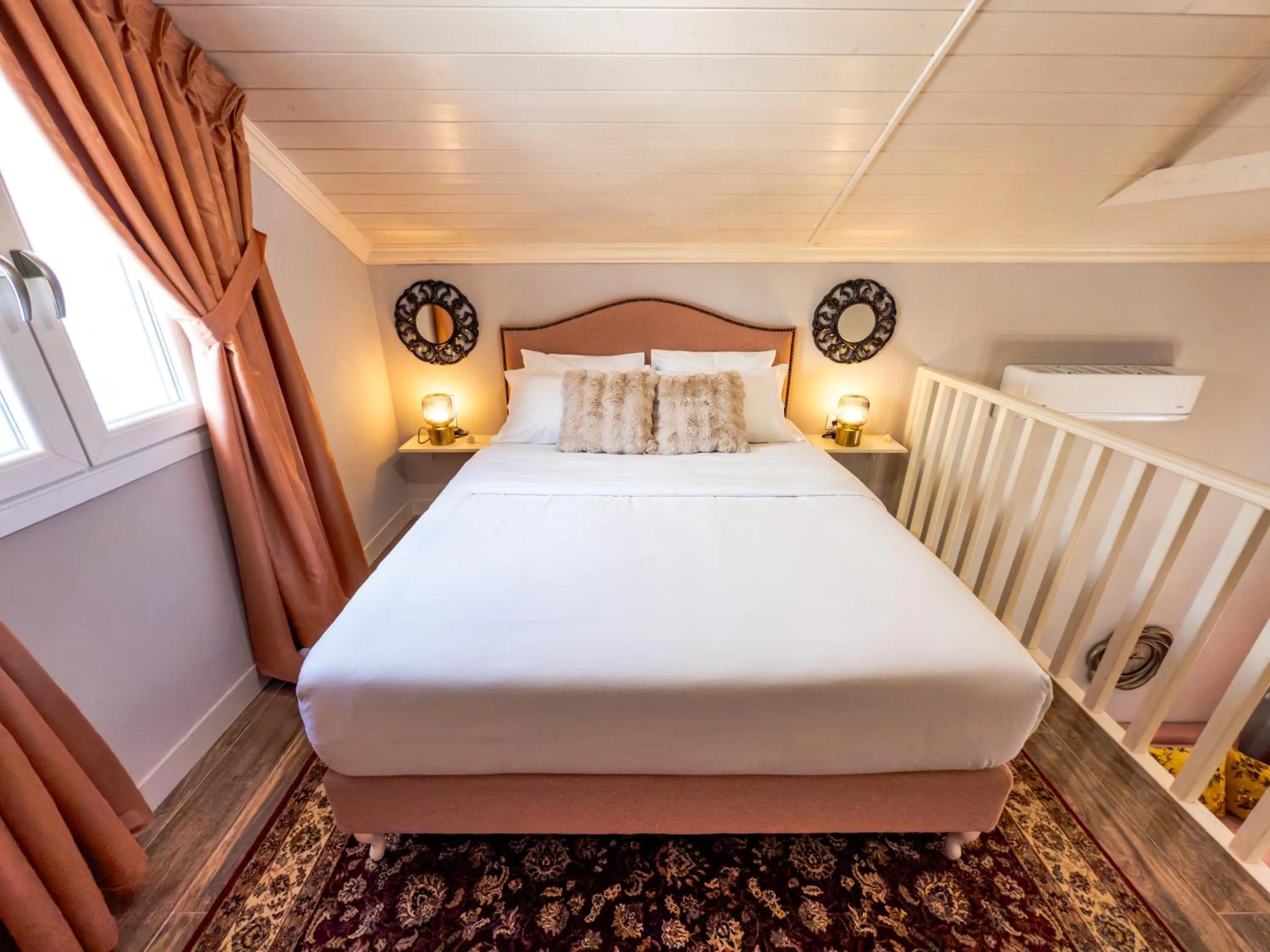 Bed in Nafsika Suites