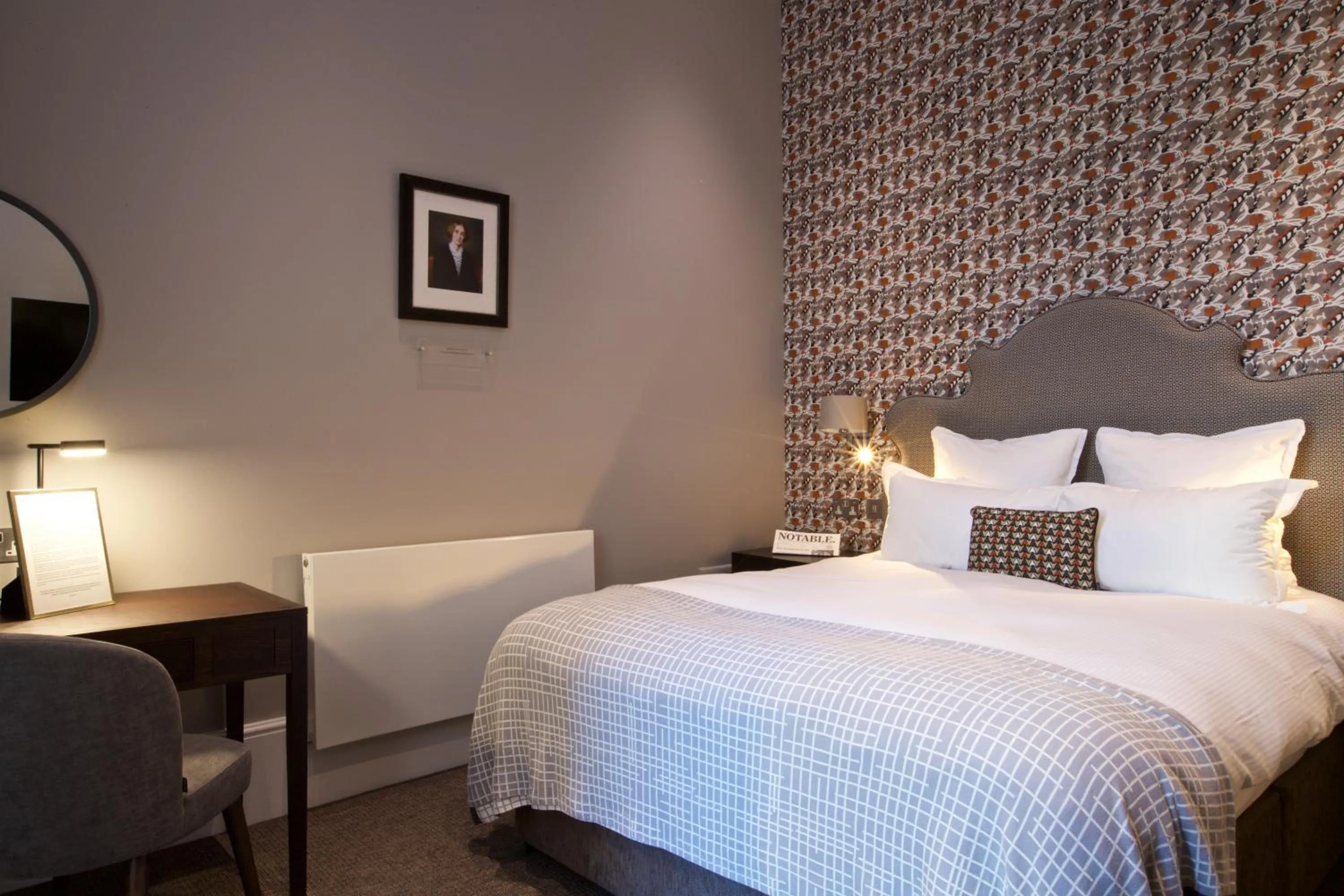 Bed in 54 Queen's Gate Hotel