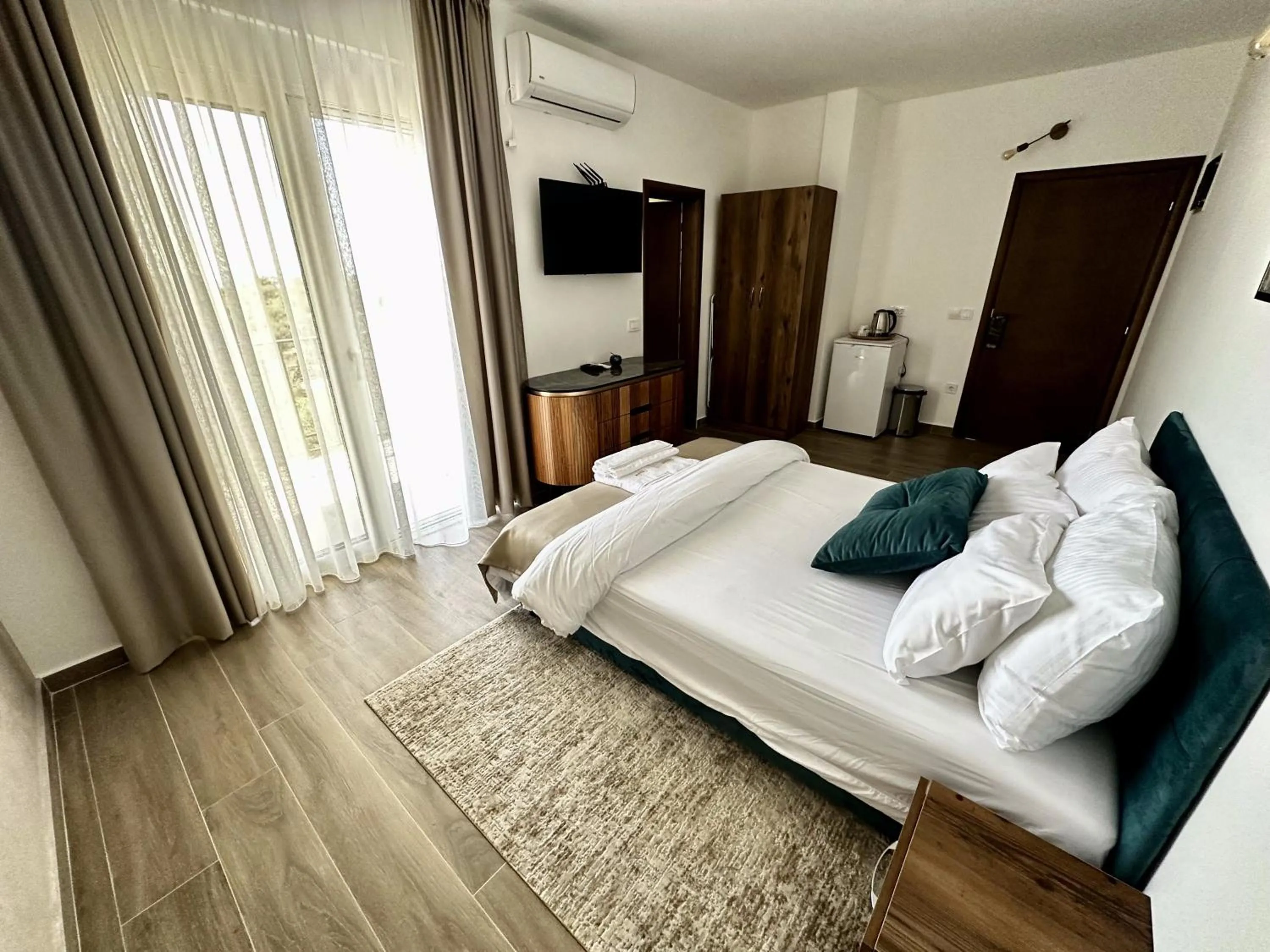 Bed in Akhdar Apartments