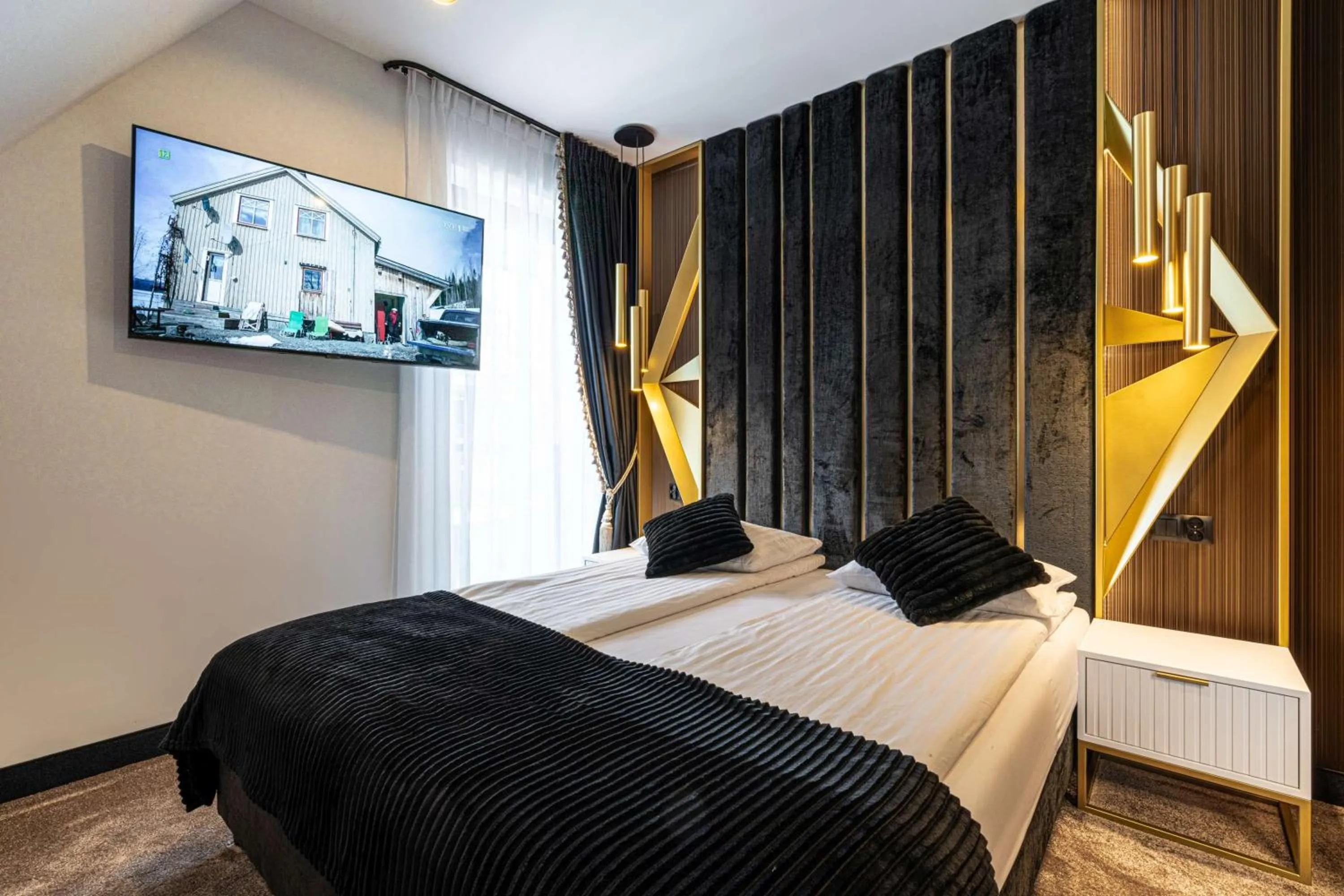 Communal lounge/ TV room, Bed in Złota Residence & SPA - 500m od Krupówek