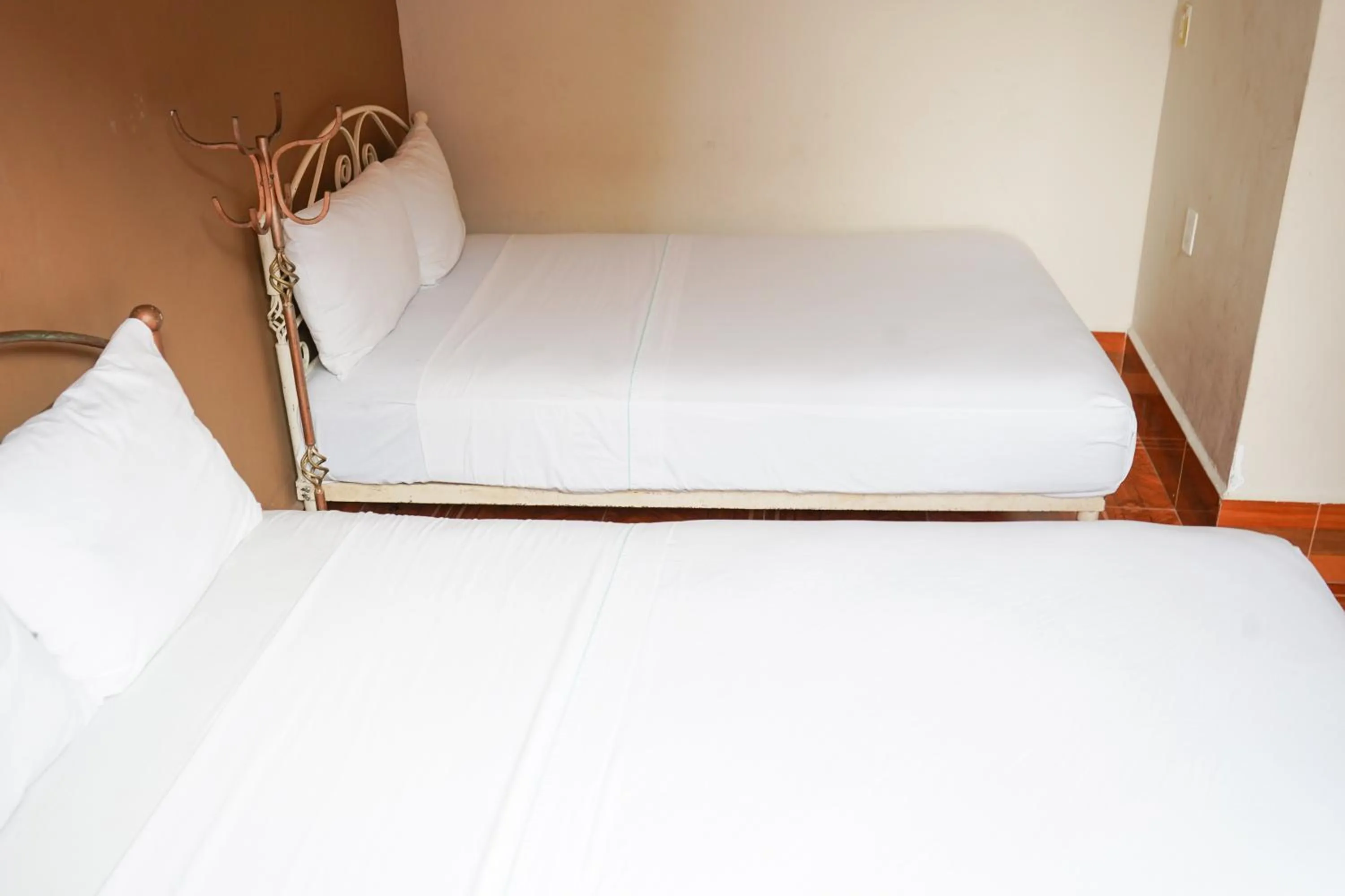 Bedroom, Bed in OYO Hotel El Conquistador