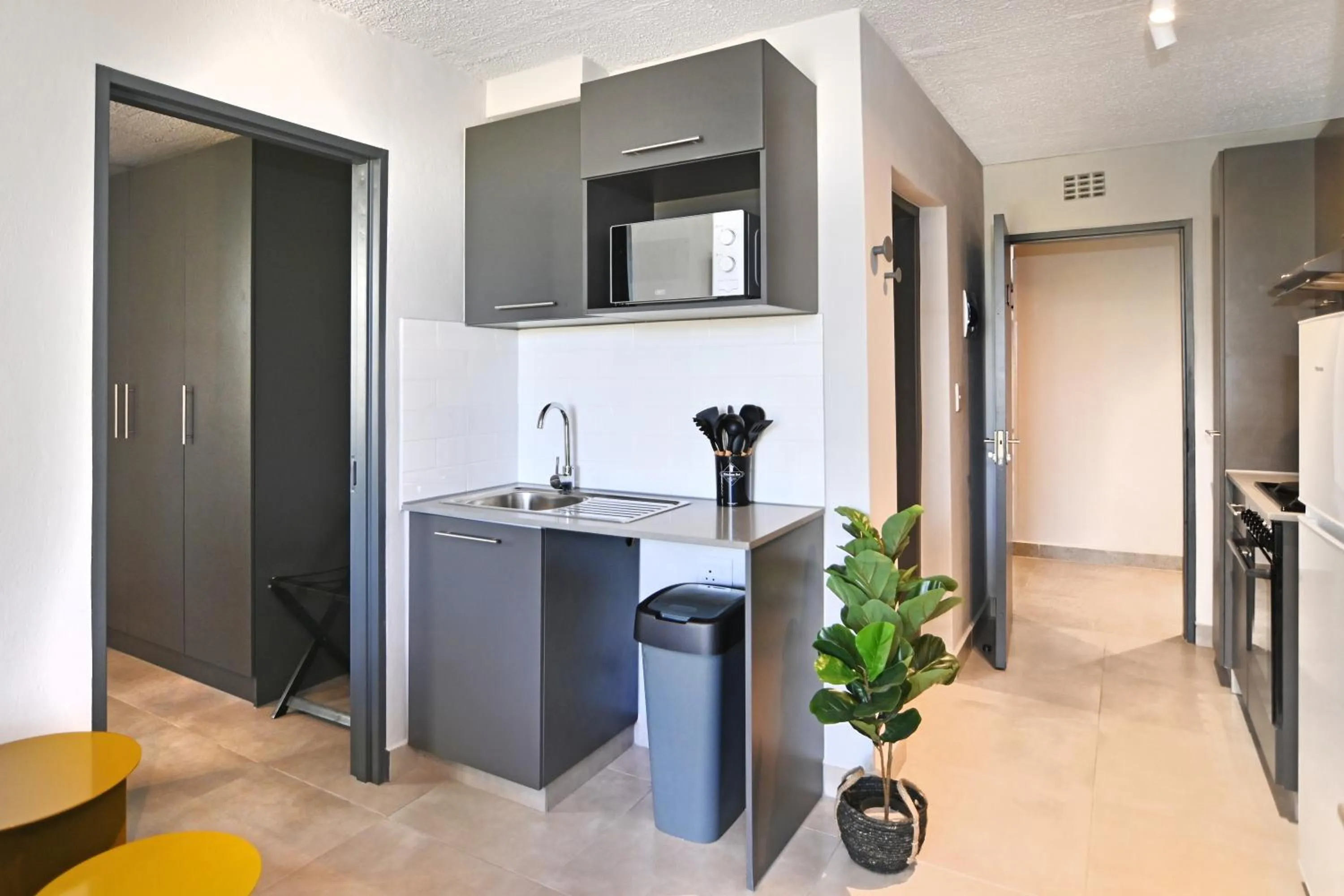 Kitchen or kitchenette in Circa Aparthotel by Totalstay