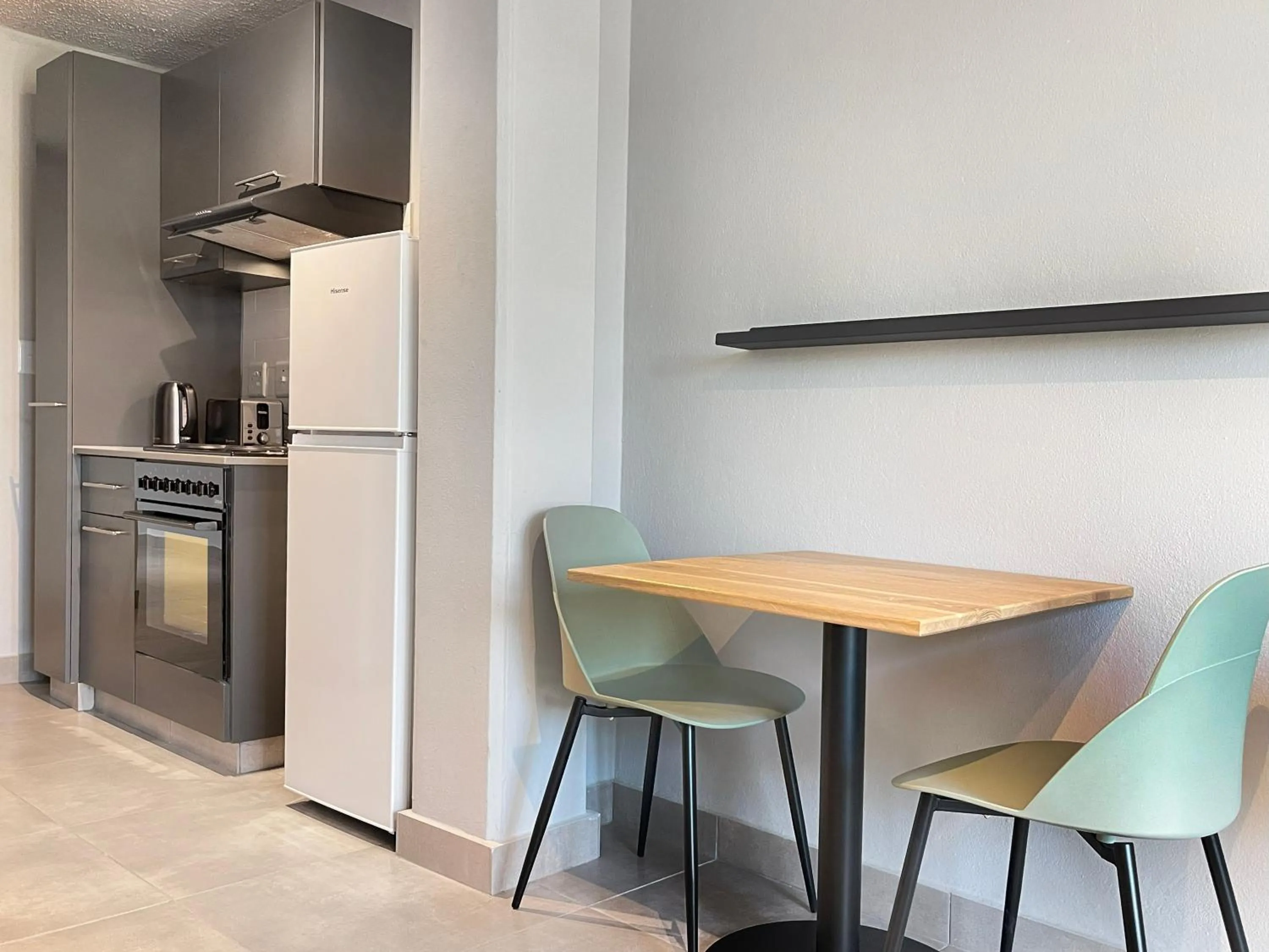 Dining area in Circa Aparthotel by Totalstay