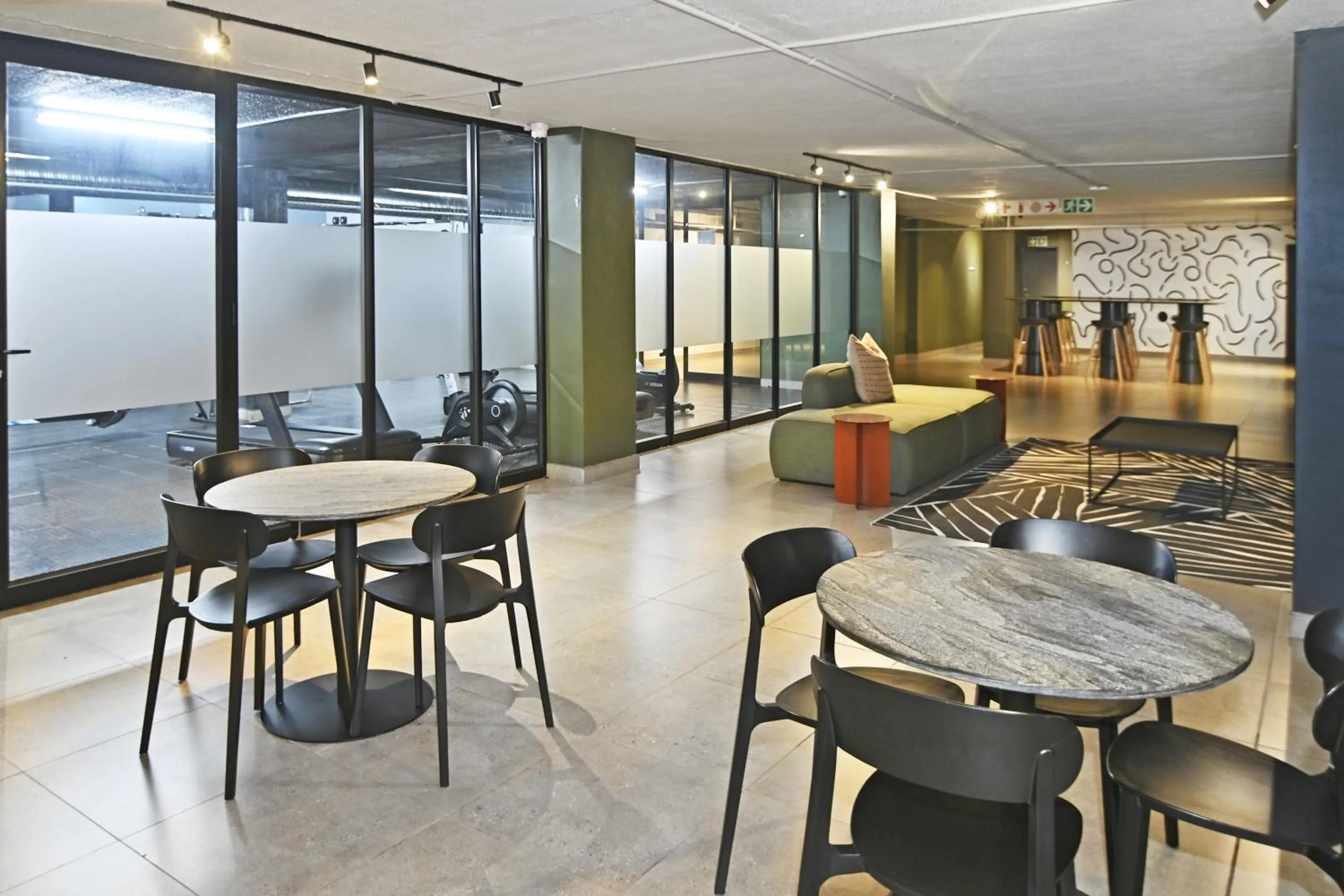 Seating area in Circa Aparthotel by Totalstay