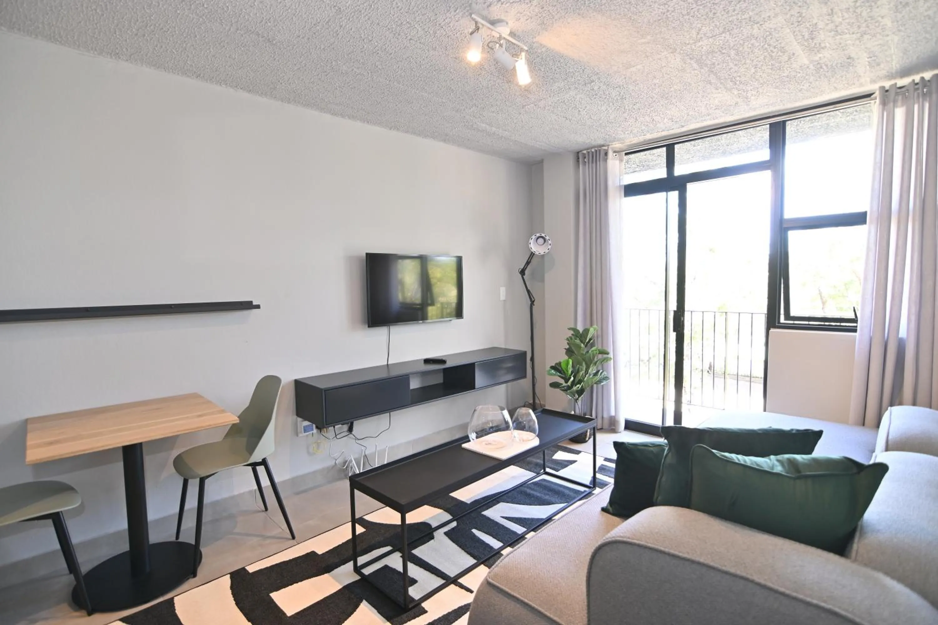 Living room in Circa Aparthotel by Totalstay