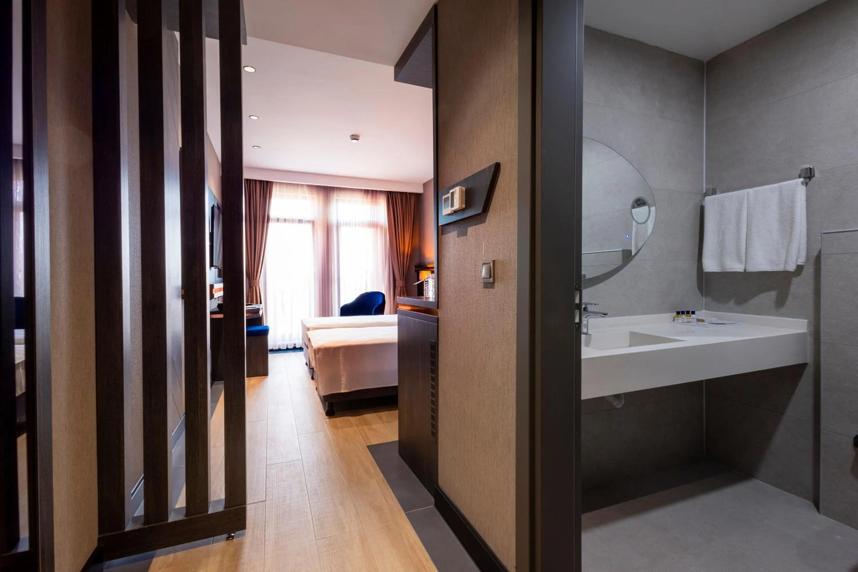 Bed in WestDoor Hotel