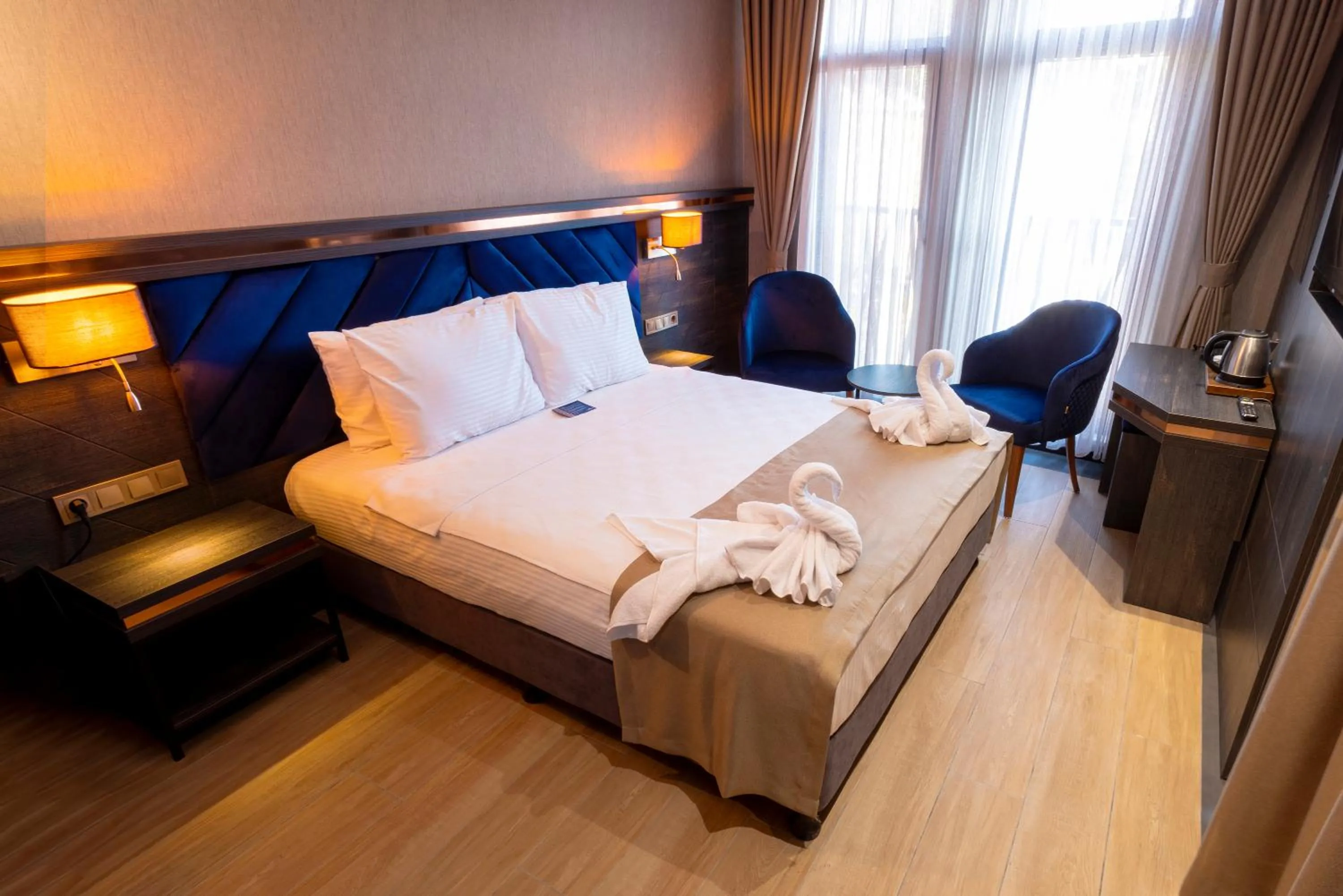 Bed in WestDoor Hotel