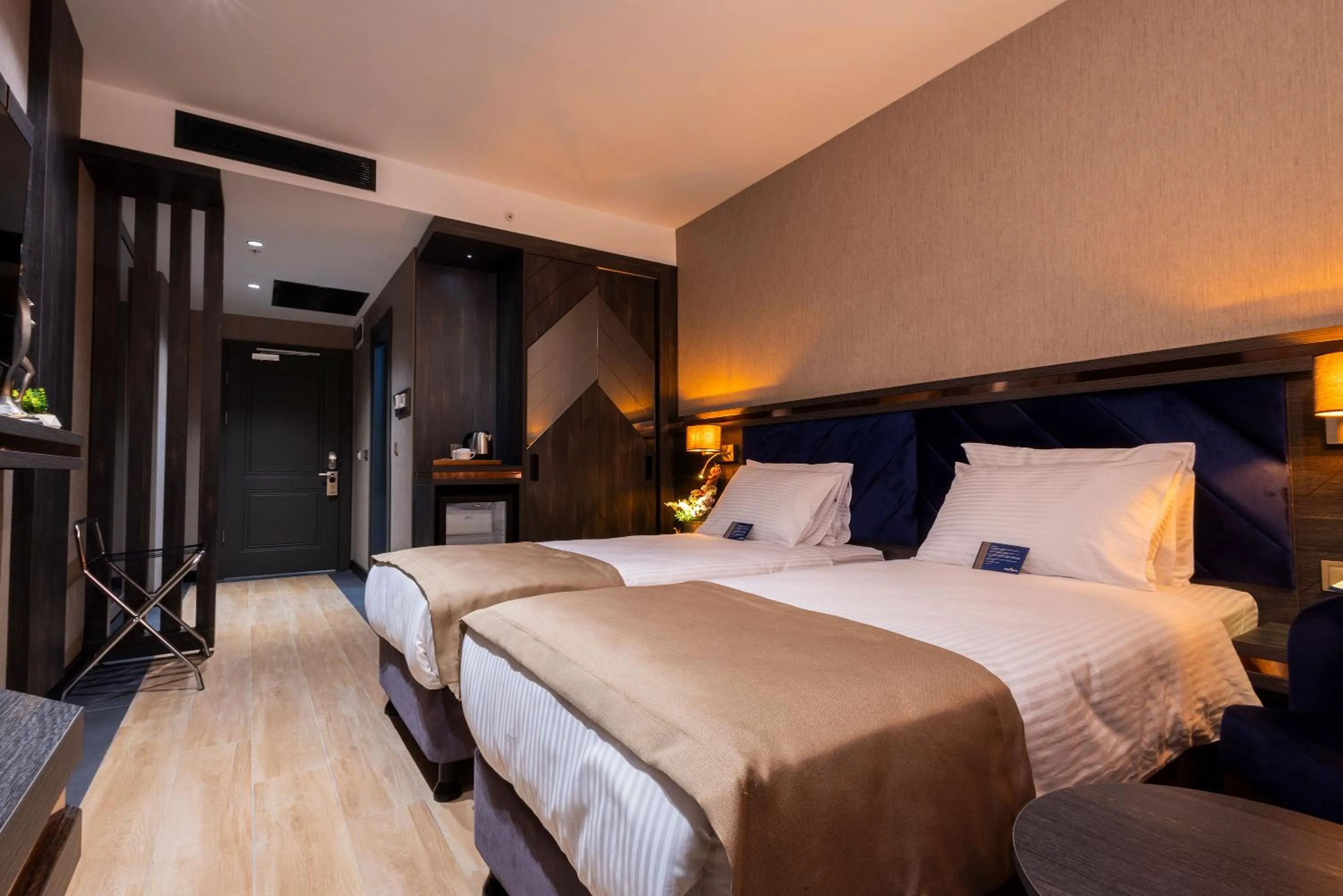 Bed in WestDoor Hotel