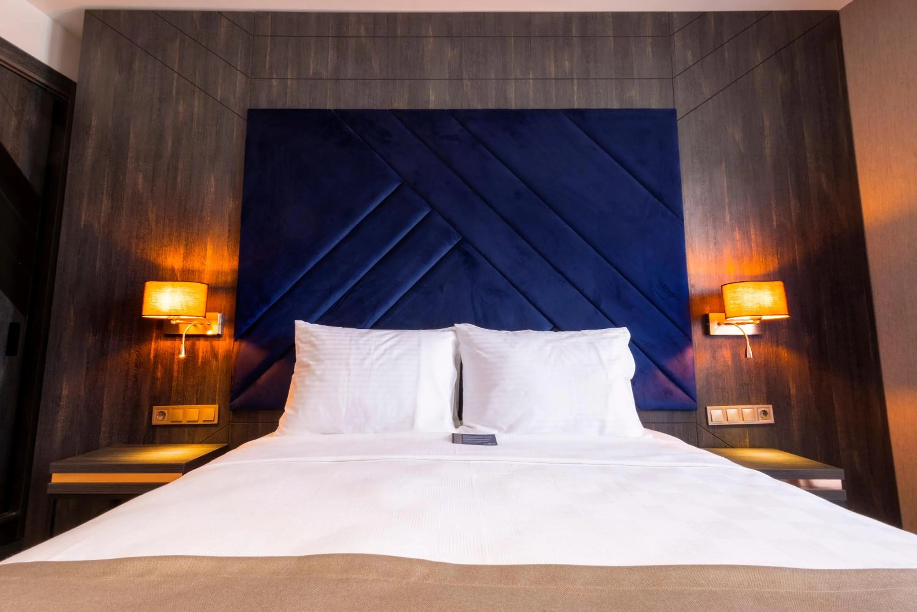 Bed in WestDoor Hotel