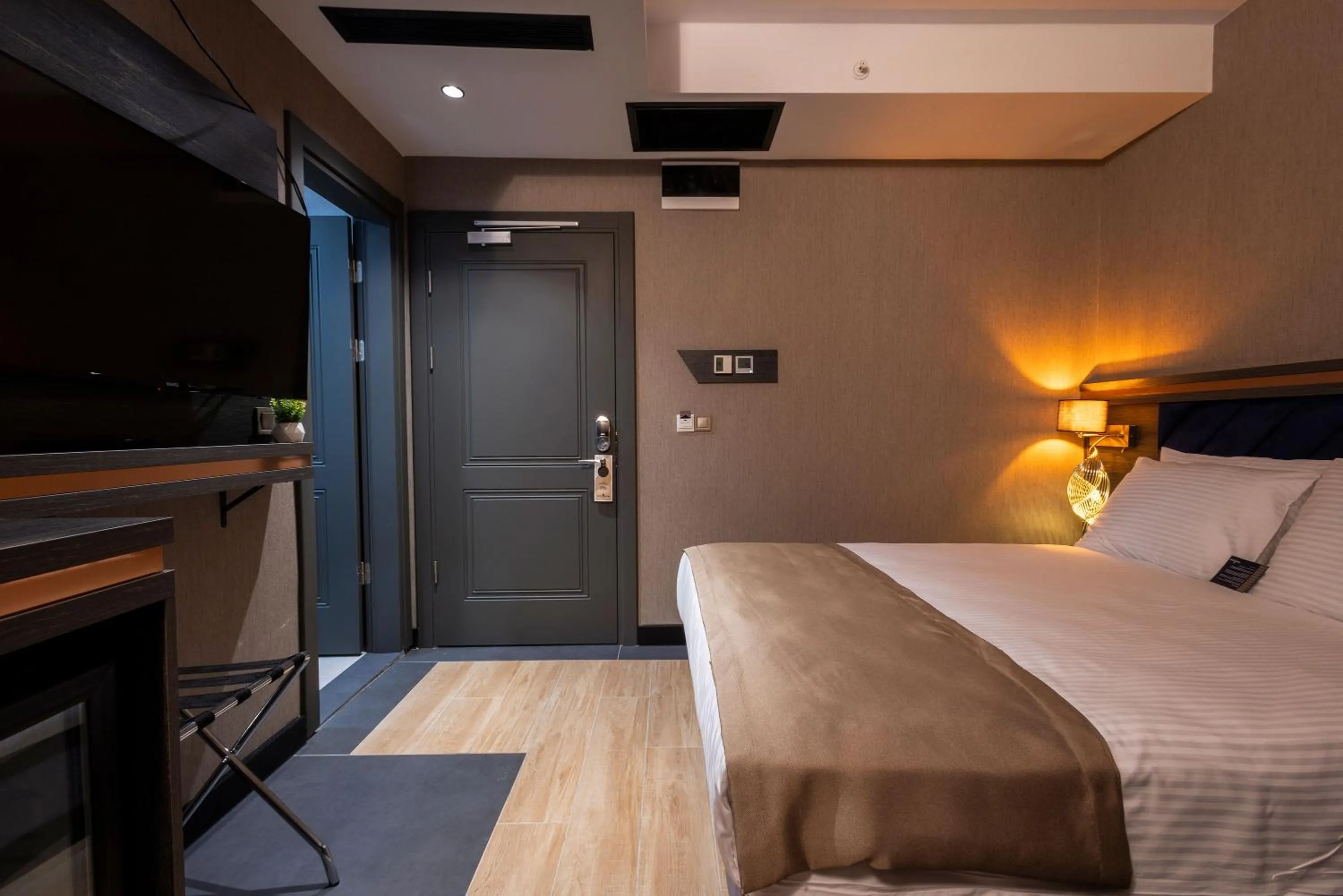 Bed in WestDoor Hotel