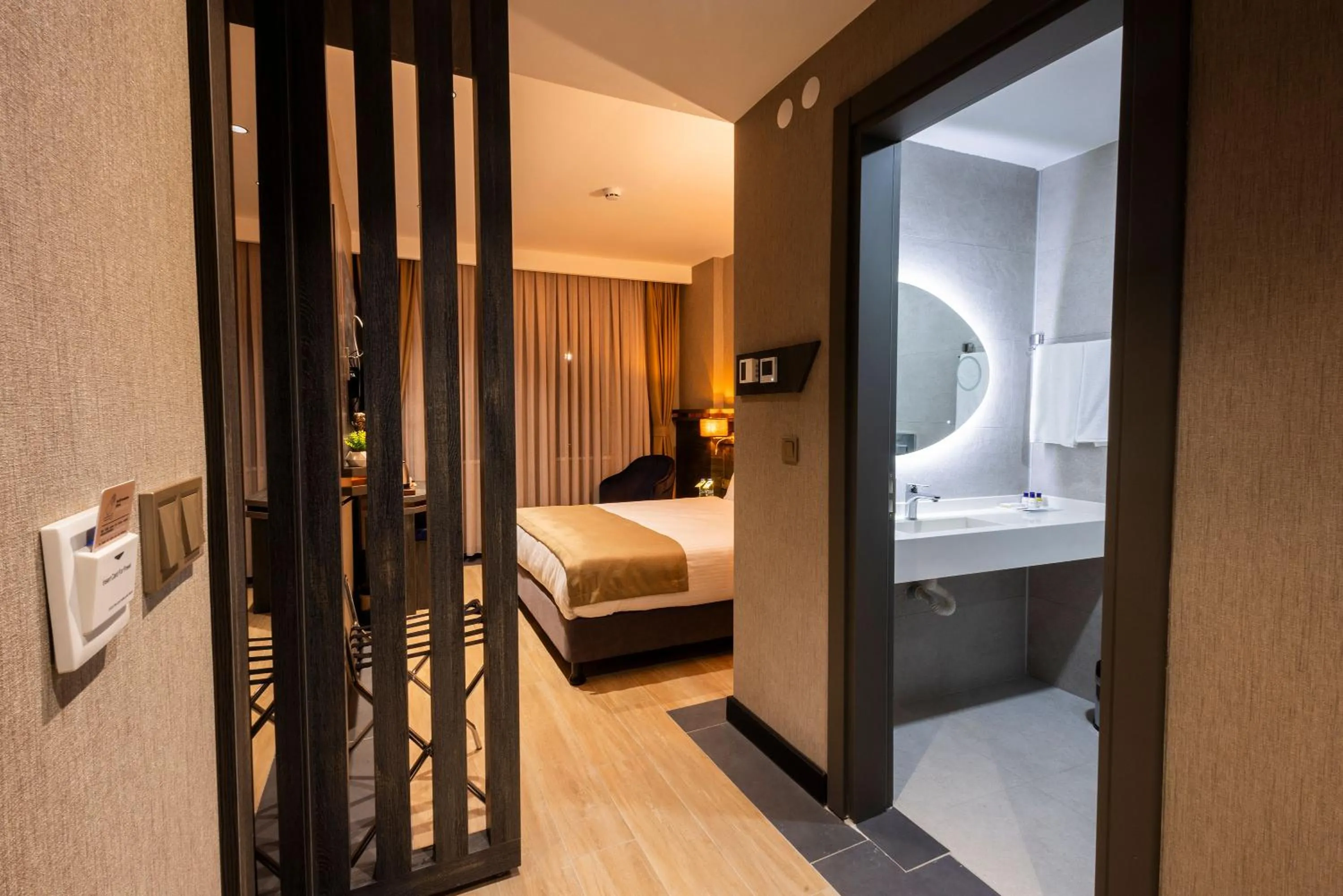 Toilet, Bed in WestDoor Hotel