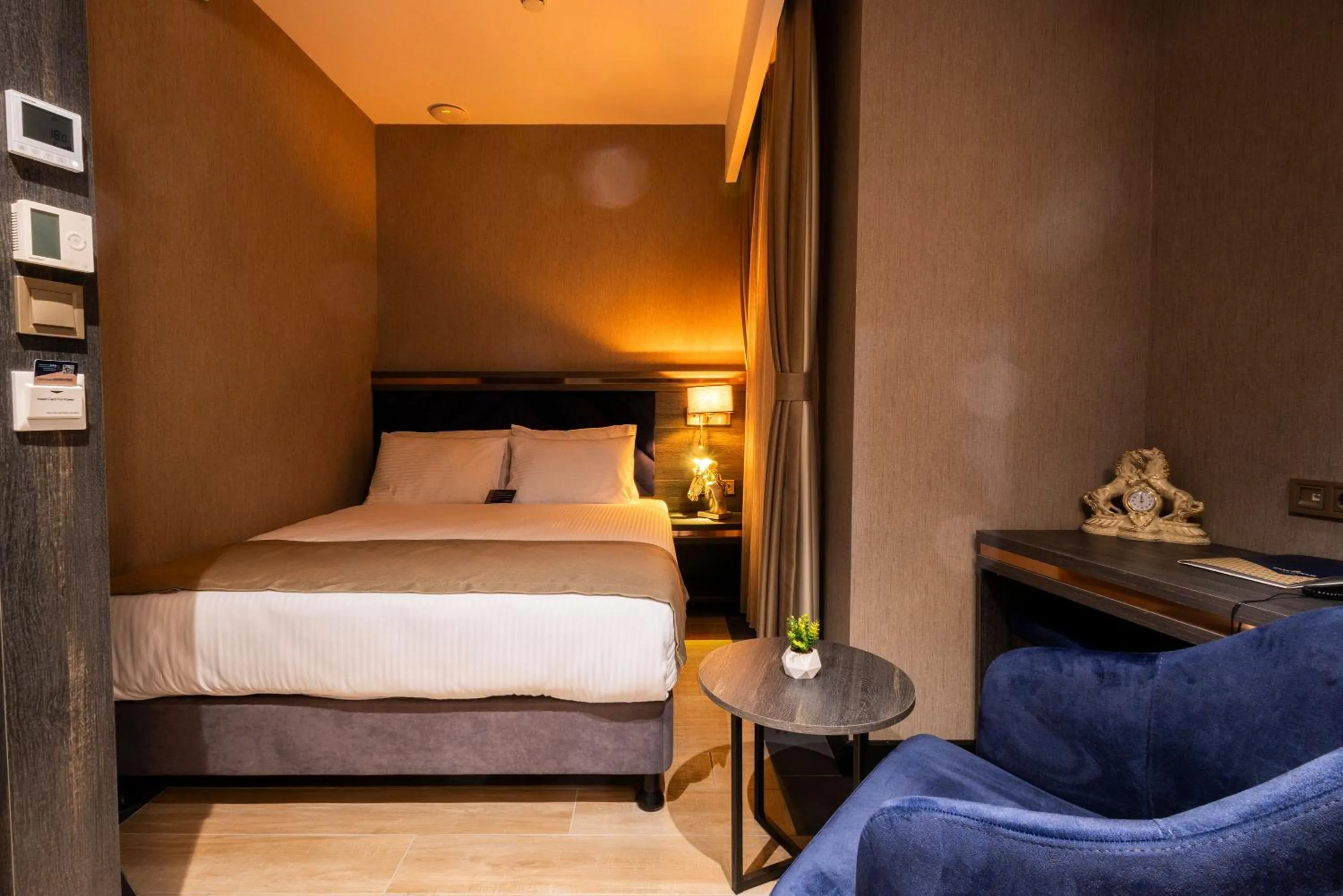 Bed in WestDoor Hotel