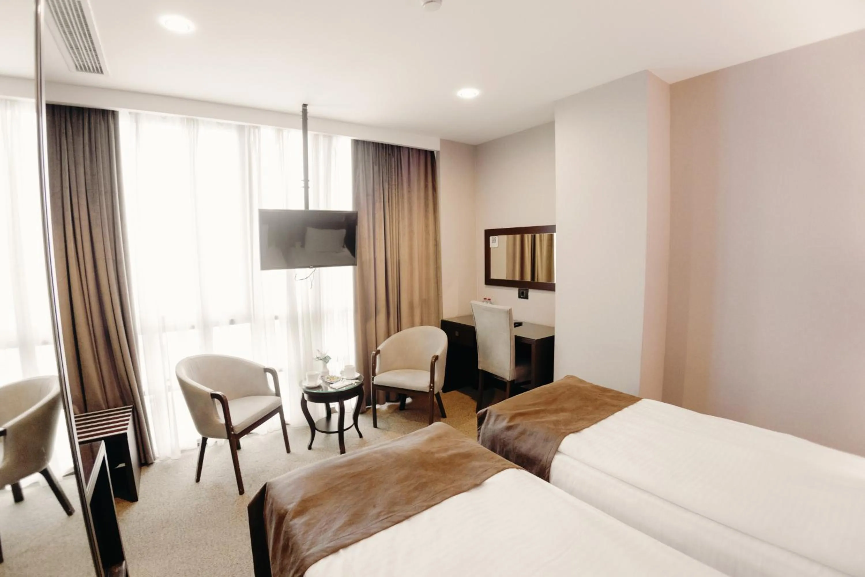 Communal lounge/ TV room in The Diamond Hotel Baku