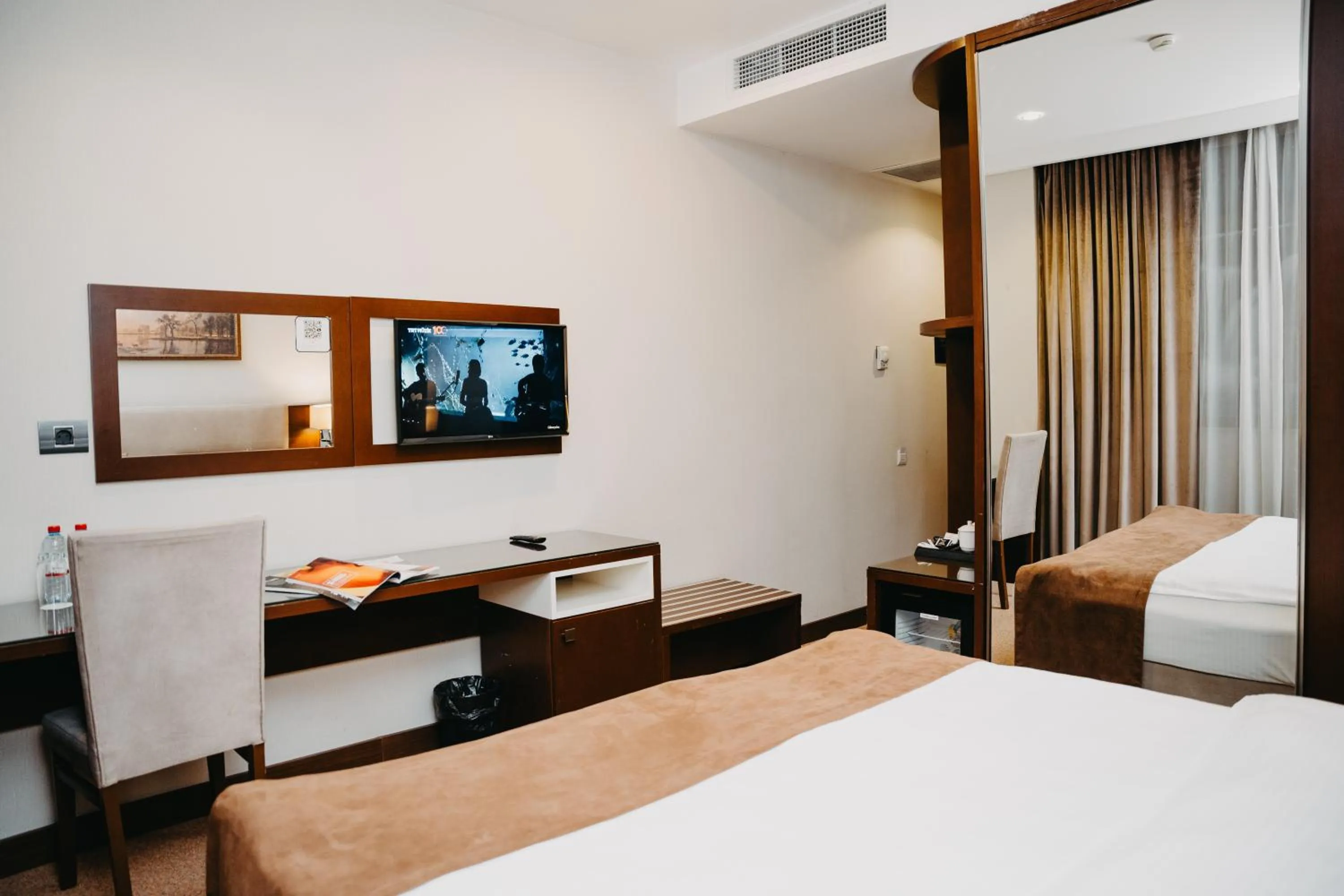 Bedroom, TV/Entertainment Center in The Diamond Hotel Baku