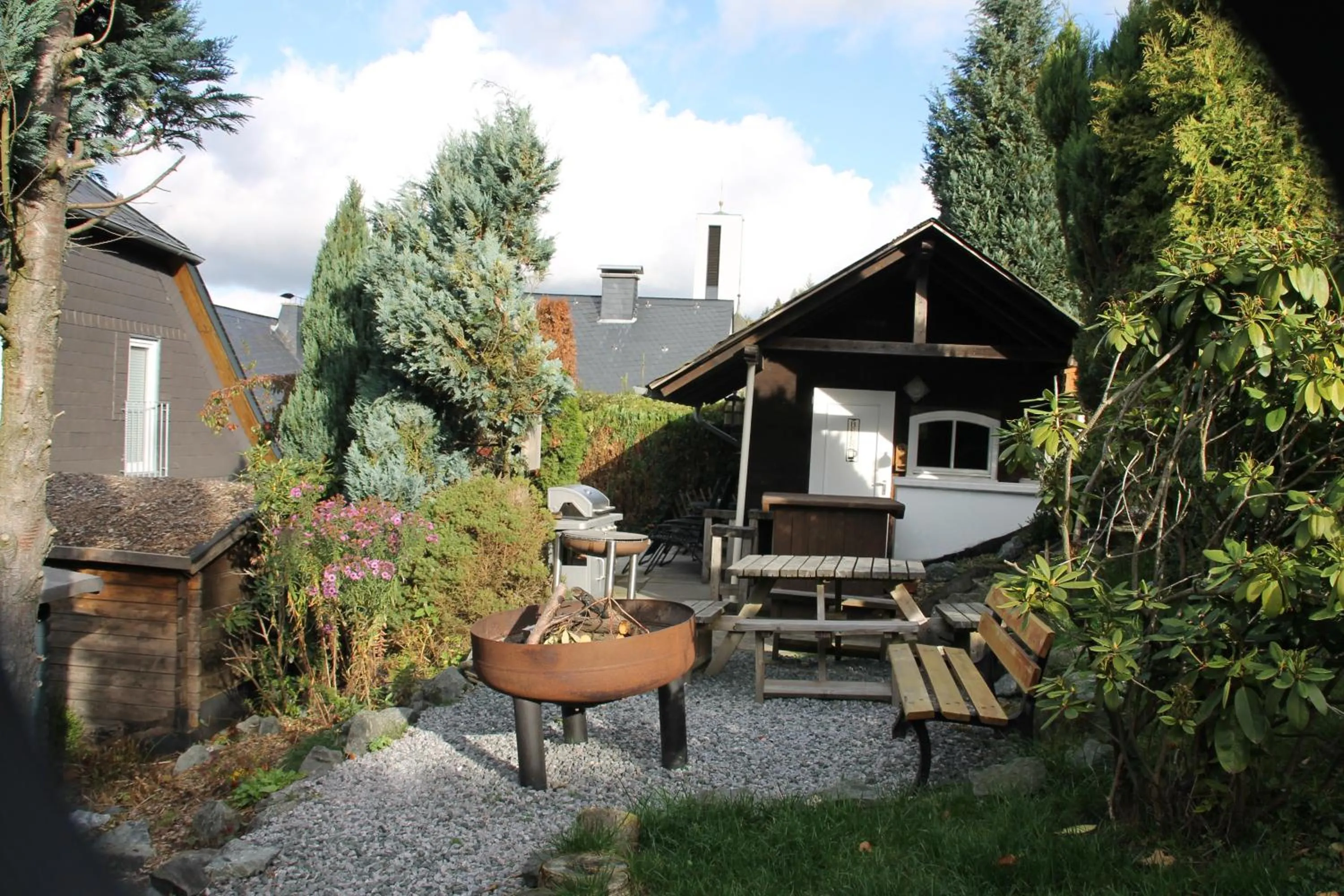 Garden view in Ferienhaus Winterberg für 12 Personen Sauna Garten Garage Hund