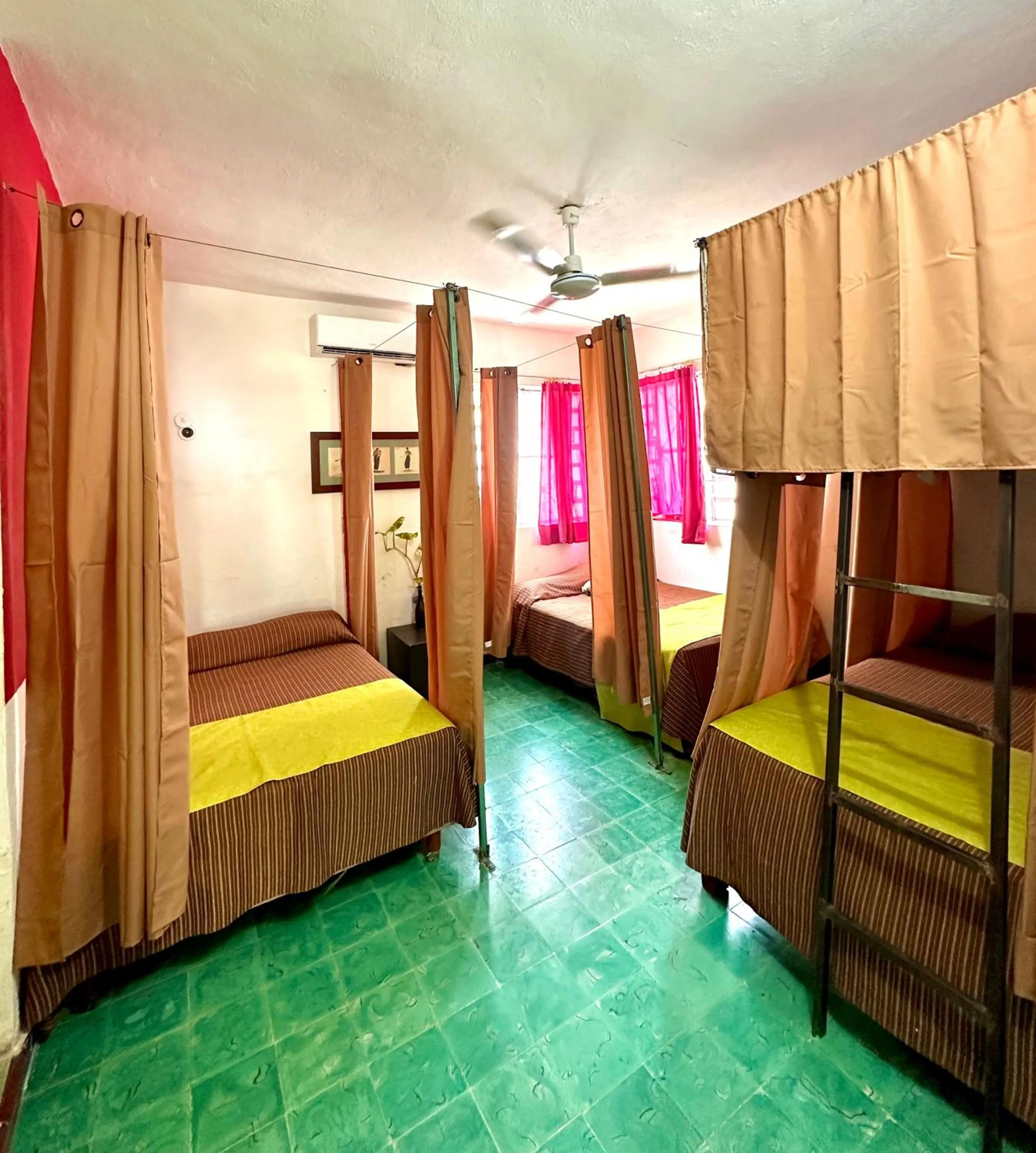 Bed in Guacamayas Hostel and Social Laundry